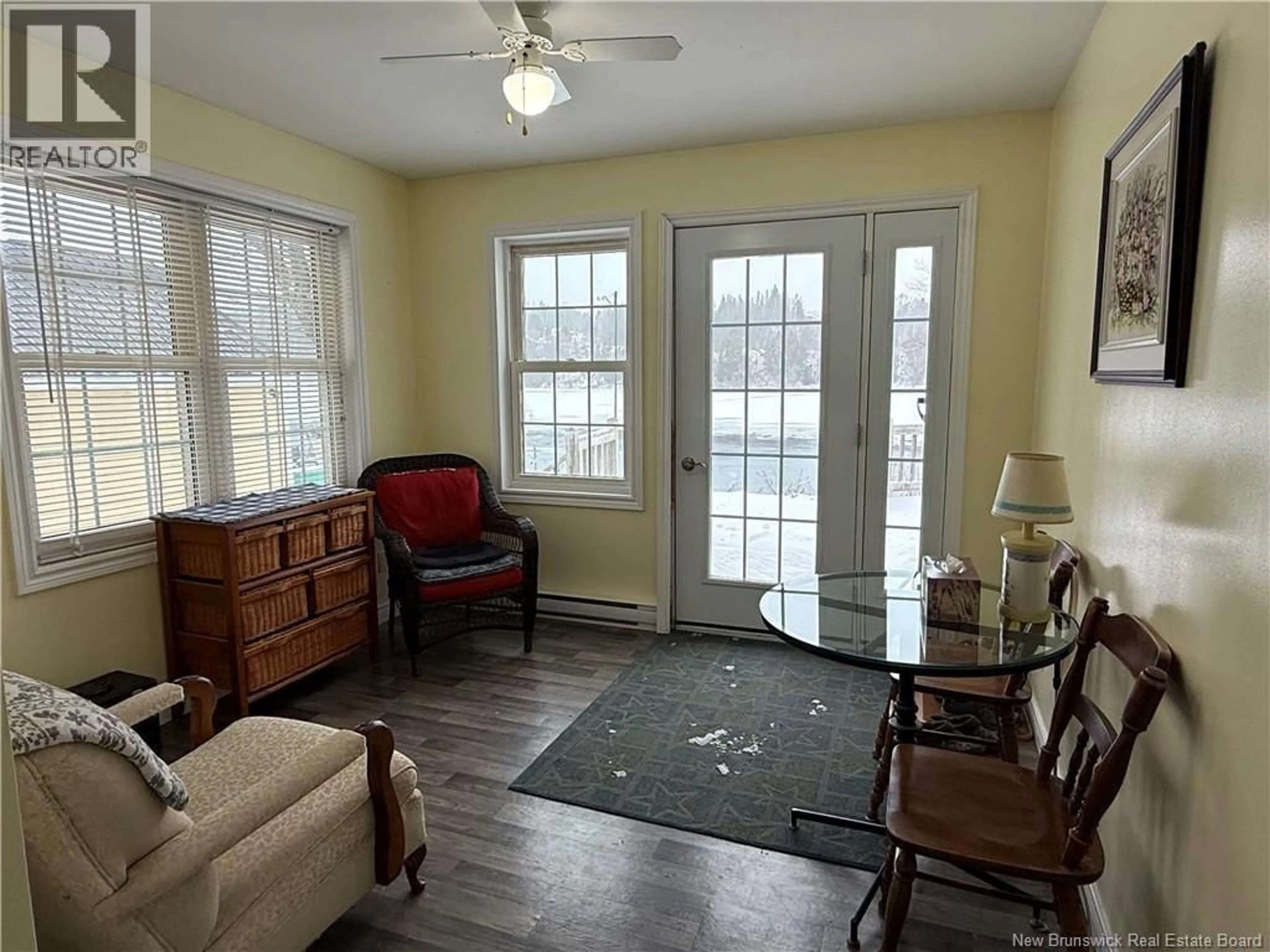 Living room with furniture, wood/laminate floor for 557 EAST RIVERSIDE DRIVE, Perth-Andover New Brunswick E7H1Y4