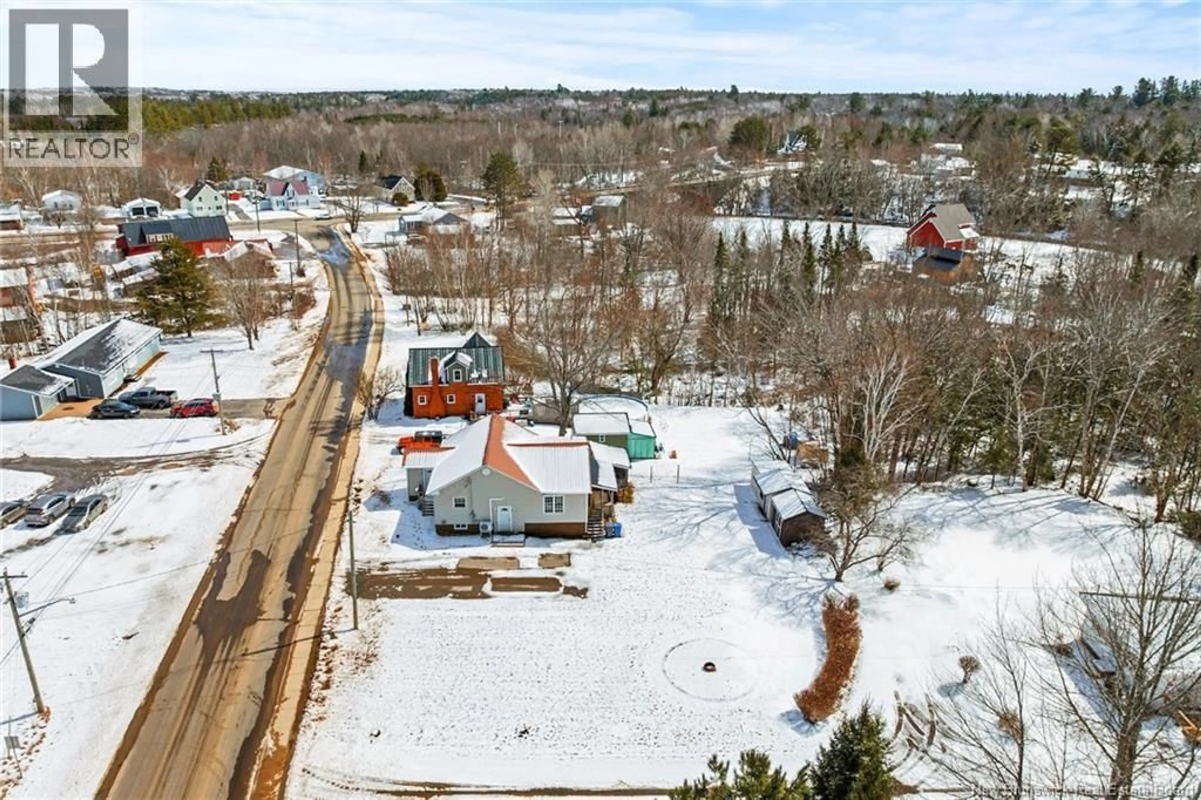 A pic from outside/outdoor area/front of a property/back of a property/a pic from drone, street for 27 BRIDGE STREET, Minto New Brunswick E4B2W9
