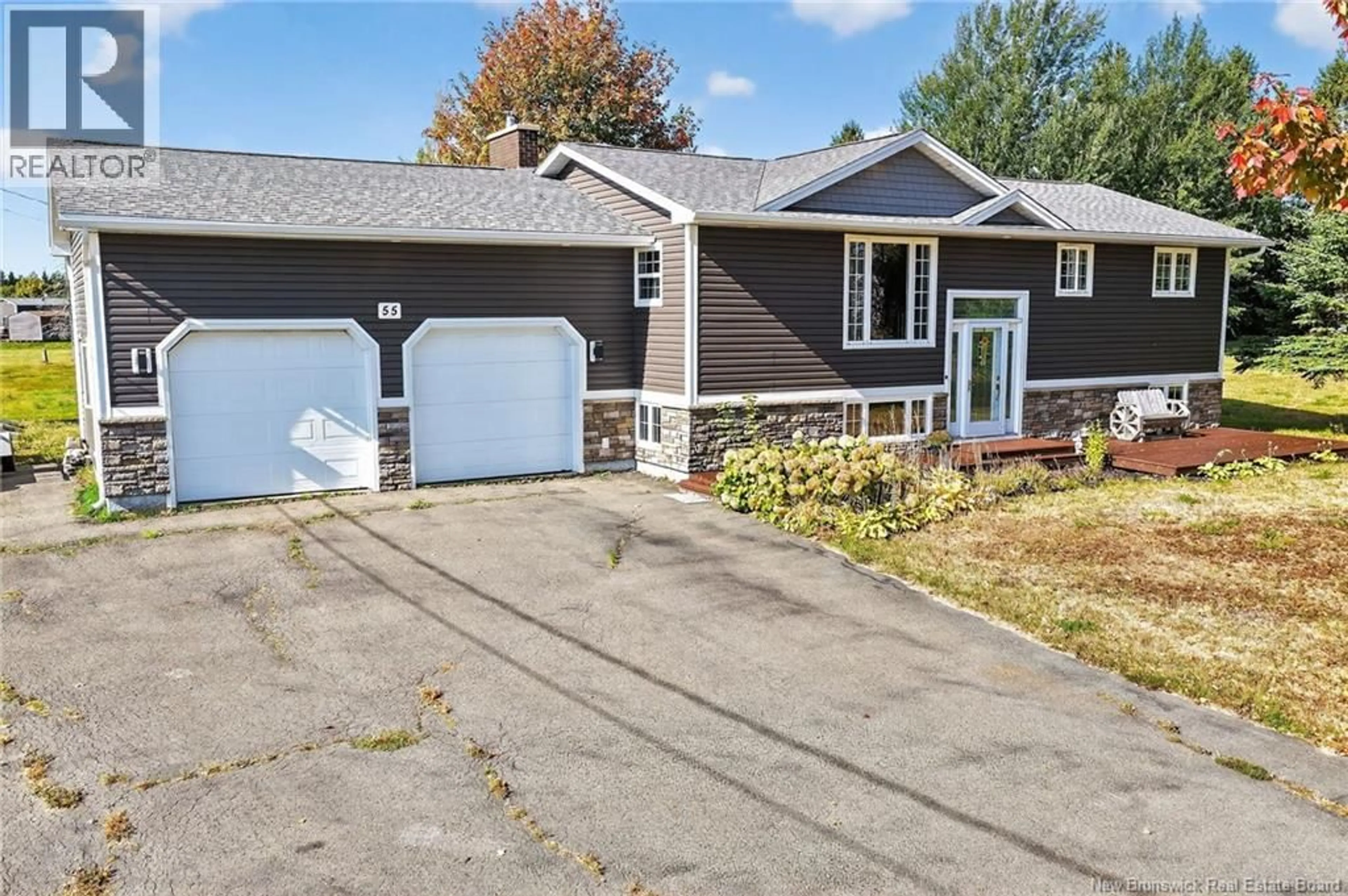 Home with vinyl exterior material, street for 55 CHEM. DES ROCHES, Bouctouche New Brunswick E4S4L9