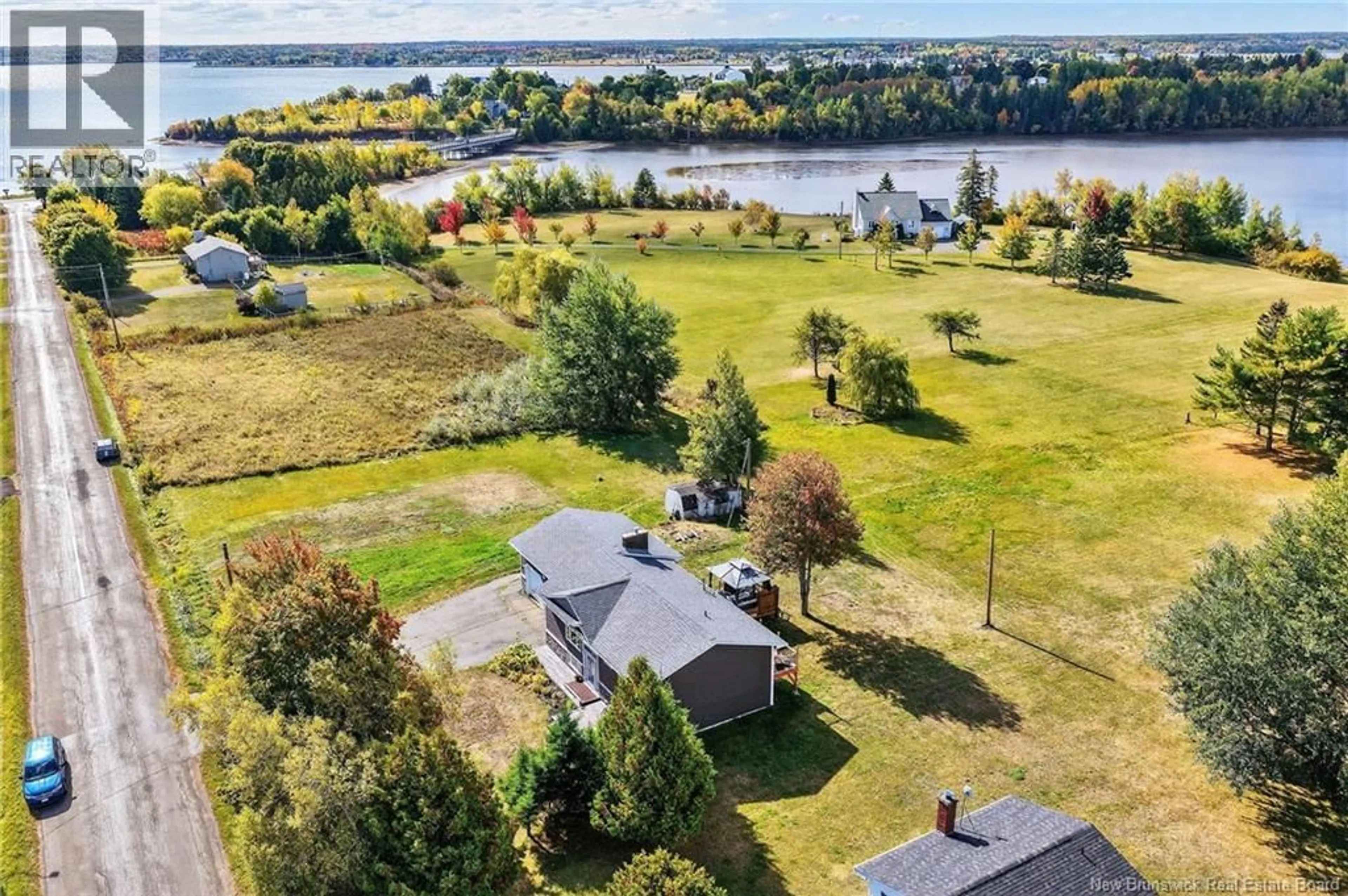 A pic from outside/outdoor area/front of a property/back of a property/a pic from drone, water/lake/river/ocean view for 55 CHEM. DES ROCHES, Bouctouche New Brunswick E4S4L9