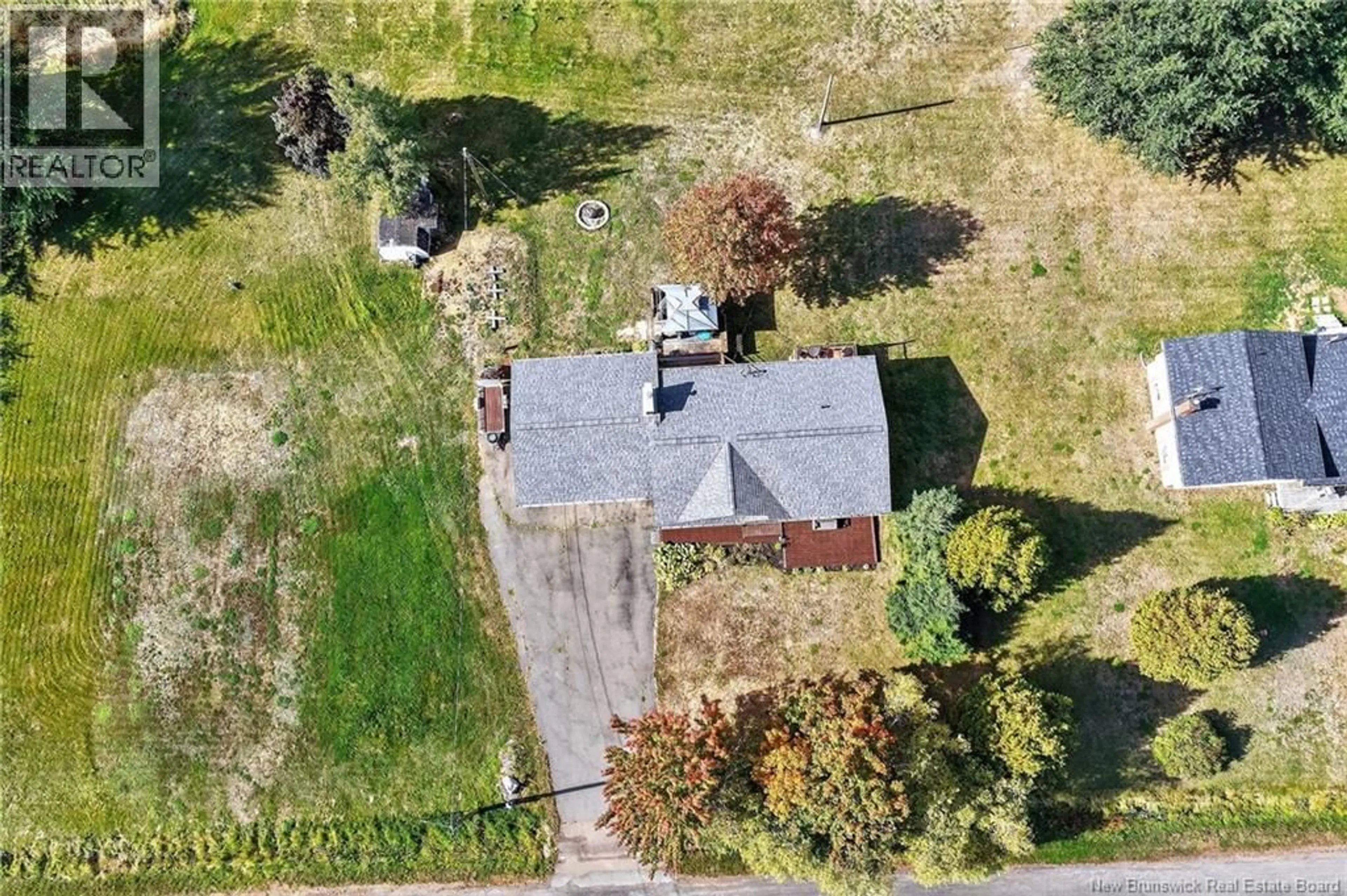 A pic from outside/outdoor area/front of a property/back of a property/a pic from drone, street for 55 CHEM. DES ROCHES, Bouctouche New Brunswick E4S4L9