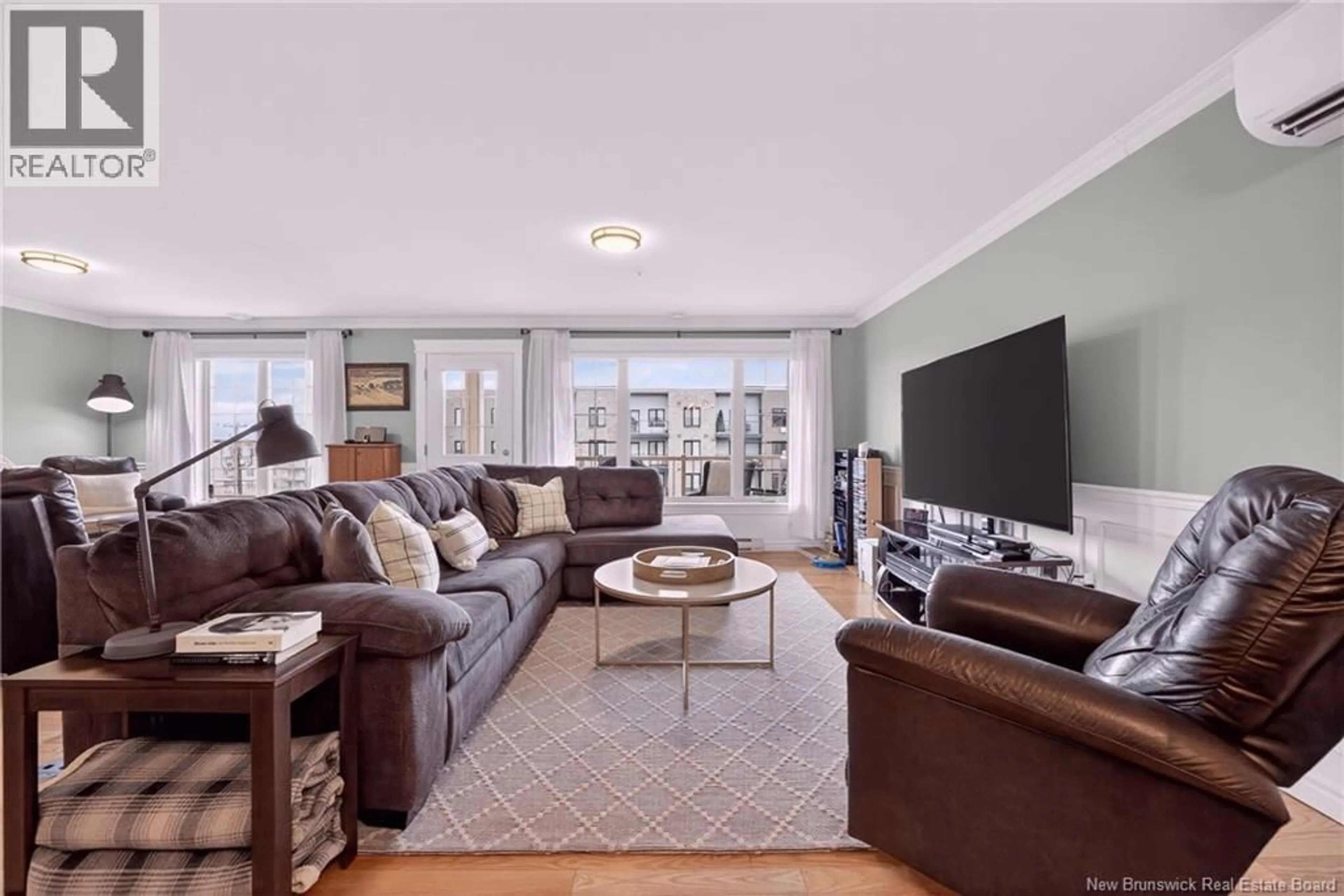 Living room with furniture, unknown for 324 - 165 VALCOUR DRIVE, Fredericton New Brunswick E3C0H5