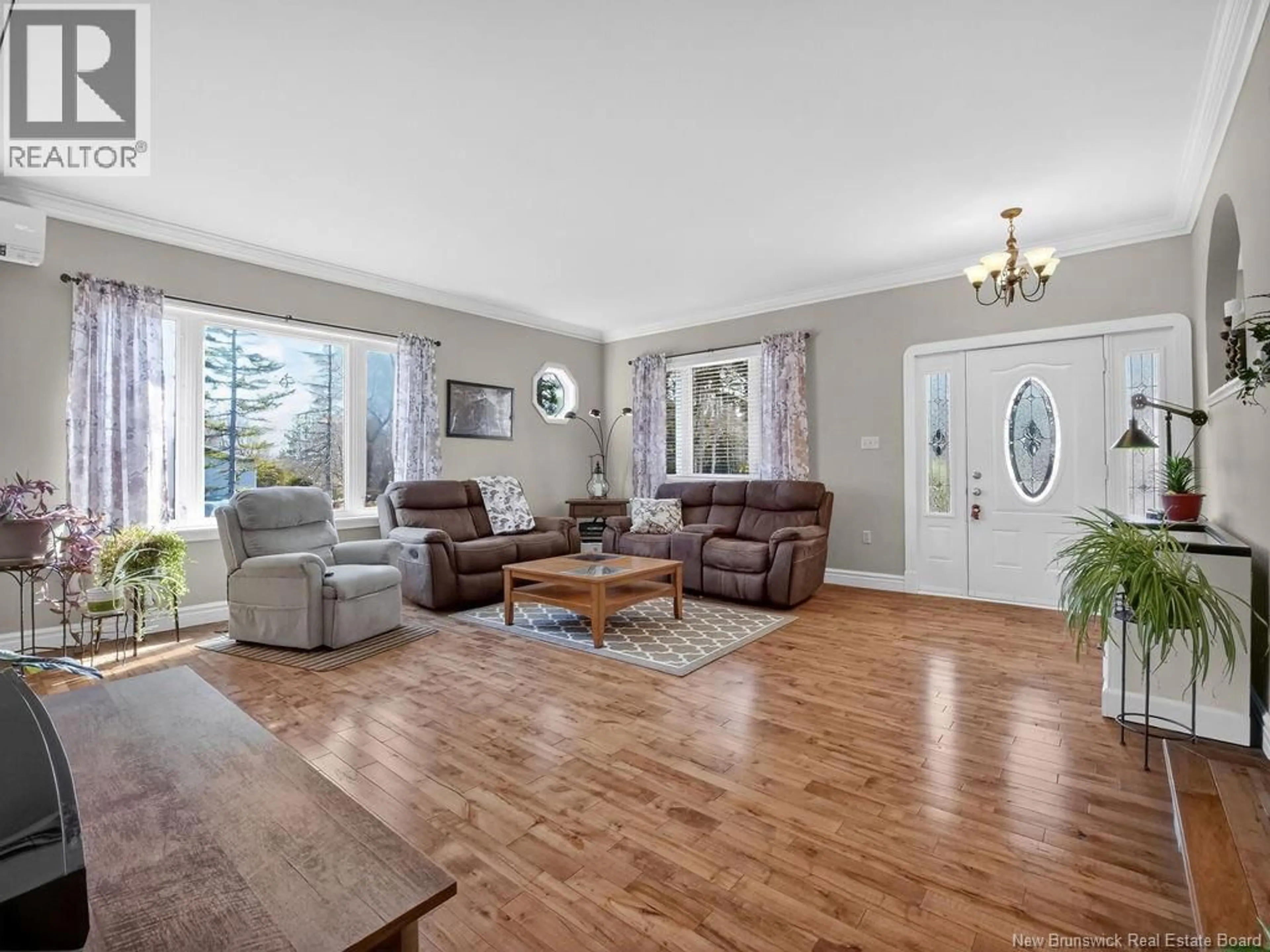 Living room with furniture, wood/laminate floor for 39 BROWN ROAD, Berry Mills New Brunswick E1G3Z5