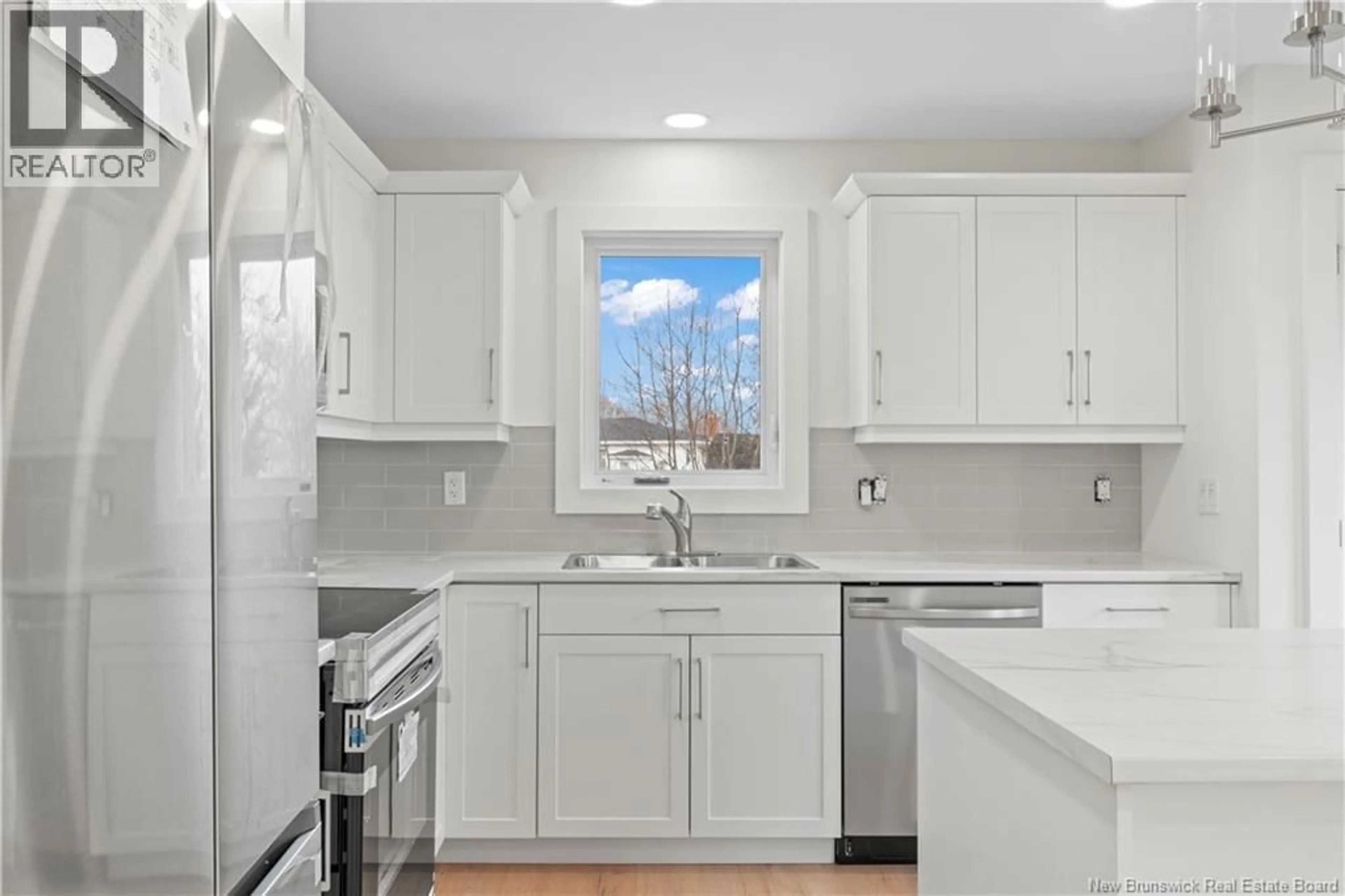 Standard kitchen, ceramic/tile floor for 46 HERON COURT, Bouctouche New Brunswick E4S0E3