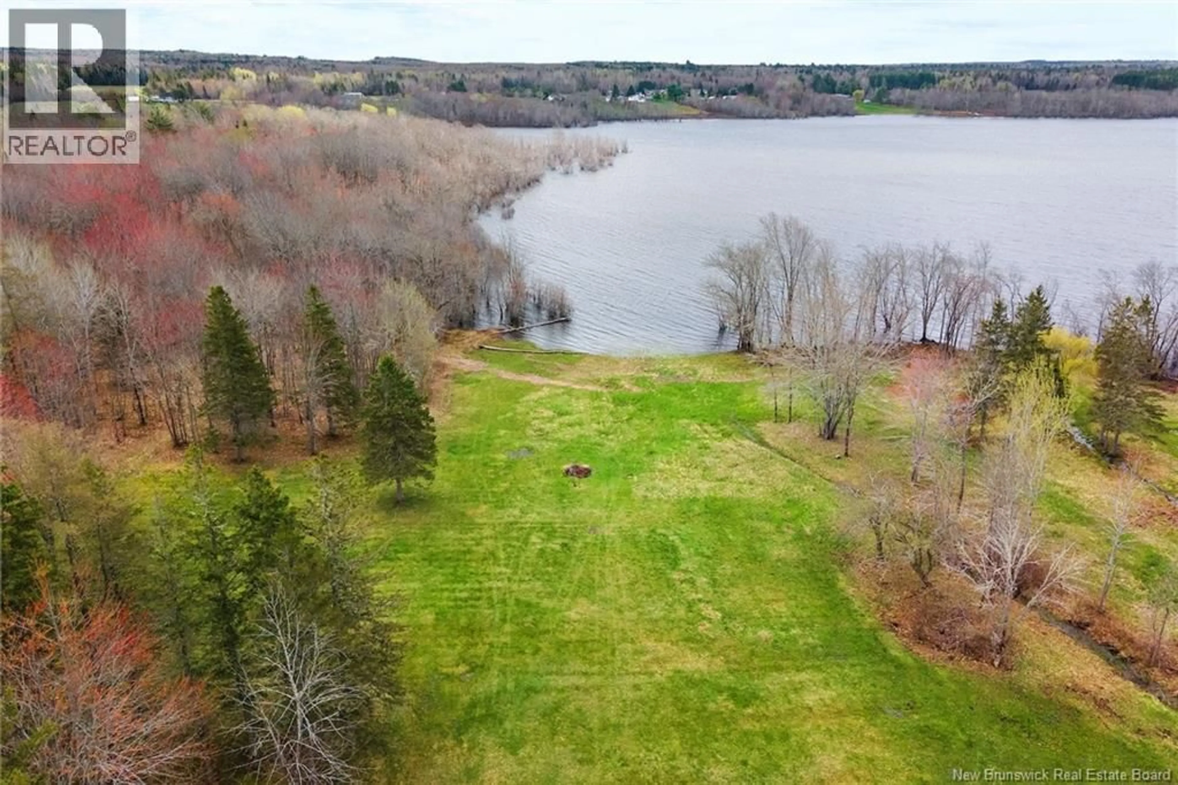A pic from outside/outdoor area/front of a property/back of a property/a pic from drone, water/lake/river/ocean view for 1520 COX POINT ROAD, Cumberland Bay New Brunswick E4A2Z7