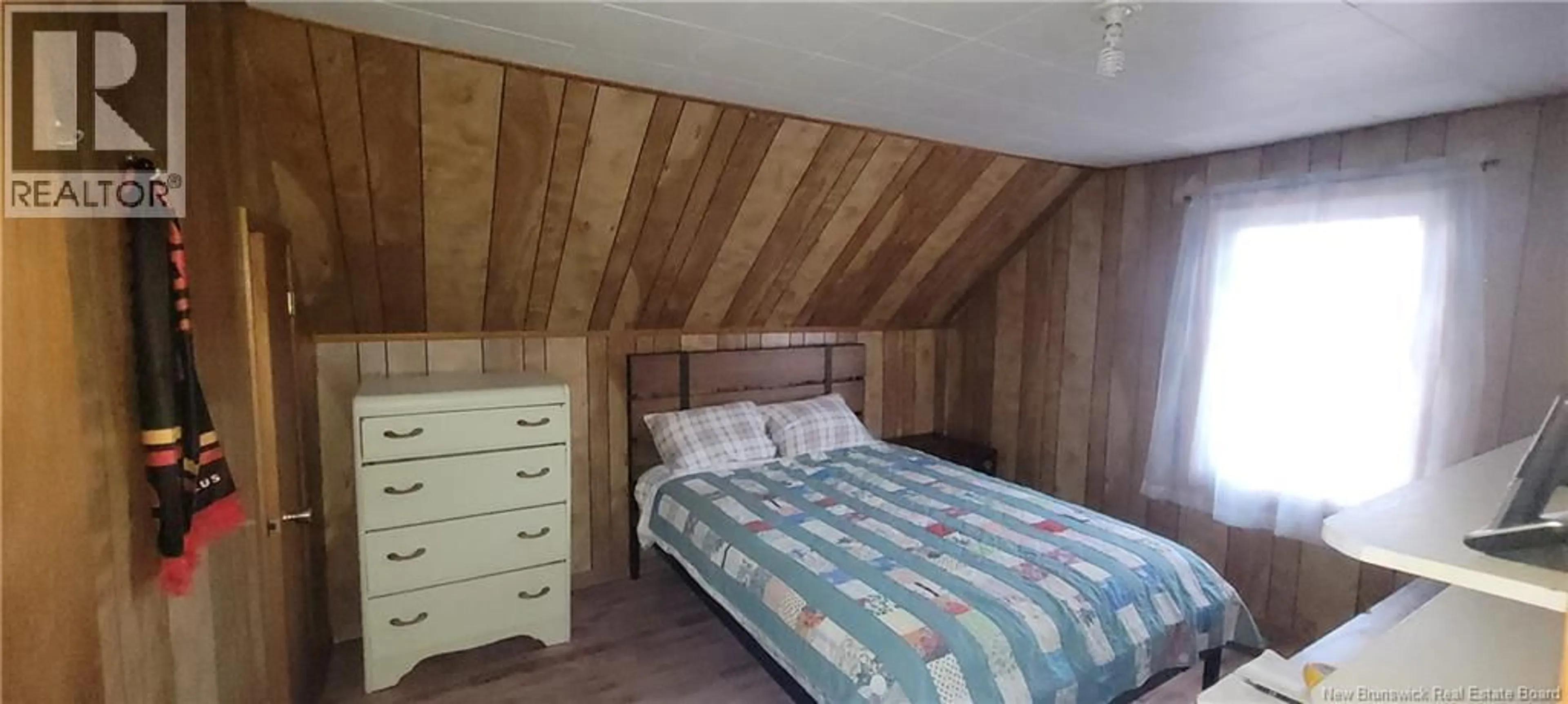 Bedroom with bed, wood/laminate floor for 1686 ROUTE 133, Barachois New Brunswick E4P8H6