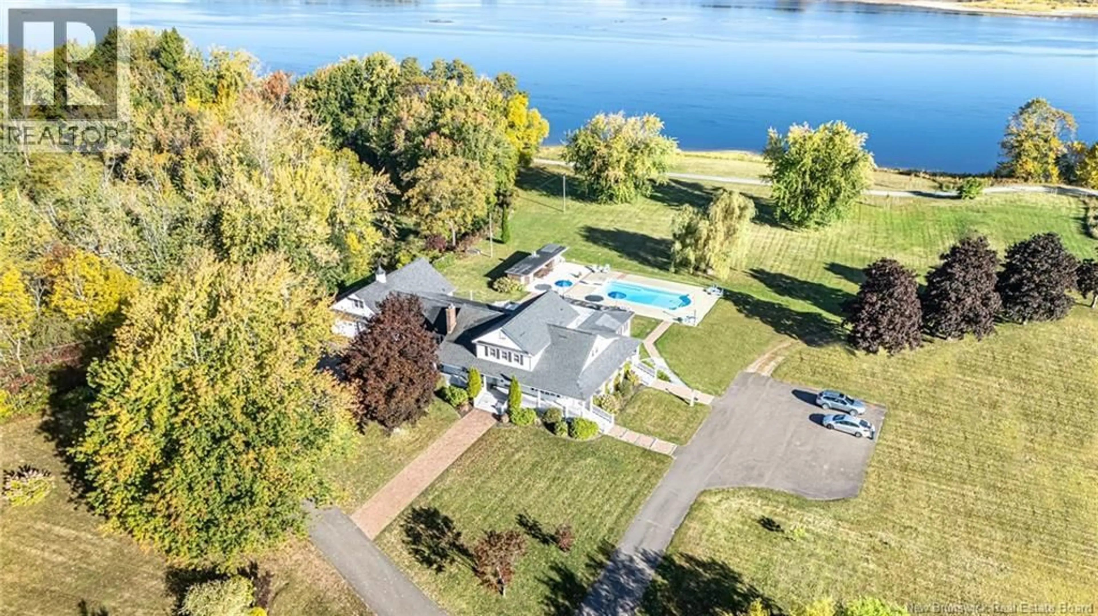 A pic from outside/outdoor area/front of a property/back of a property/a pic from drone, water/lake/river/ocean view for 1337 WOODSTOCK ROAD, Fredericton New Brunswick E3B7R9