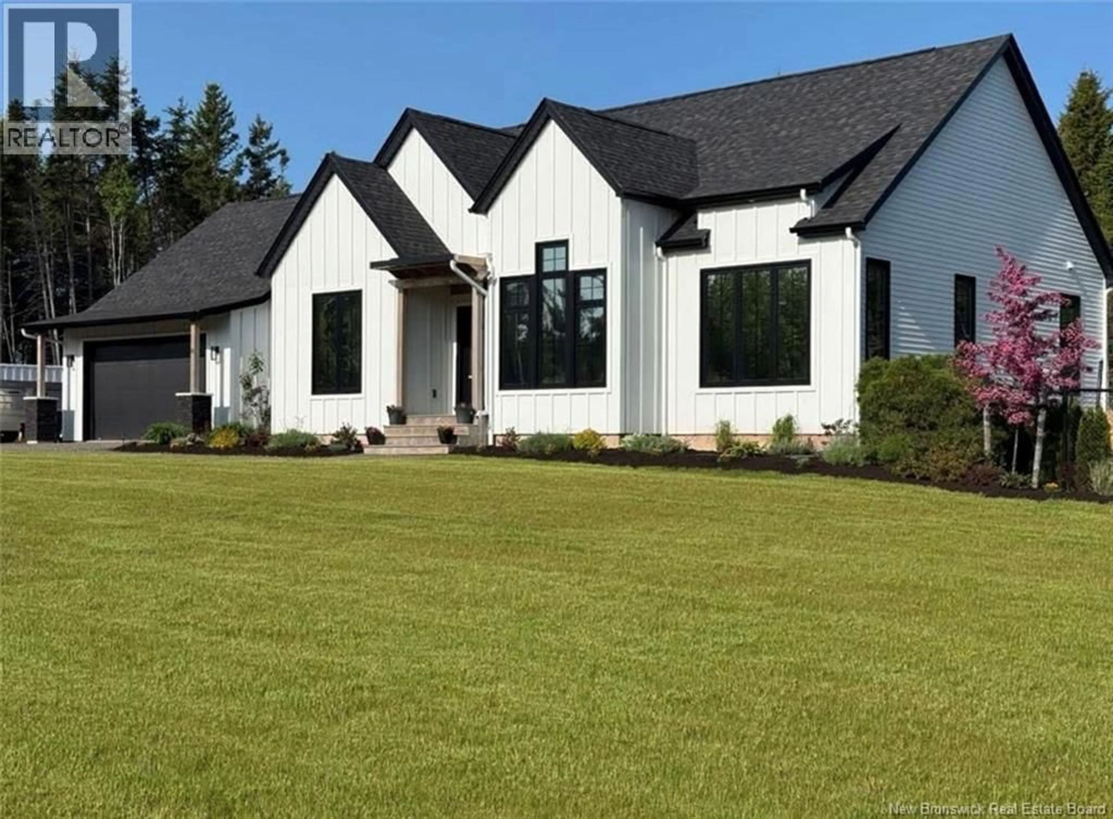 Home with vinyl exterior material, mountain view for 16 RENARD STREET, Barachois New Brunswick E4P0T7