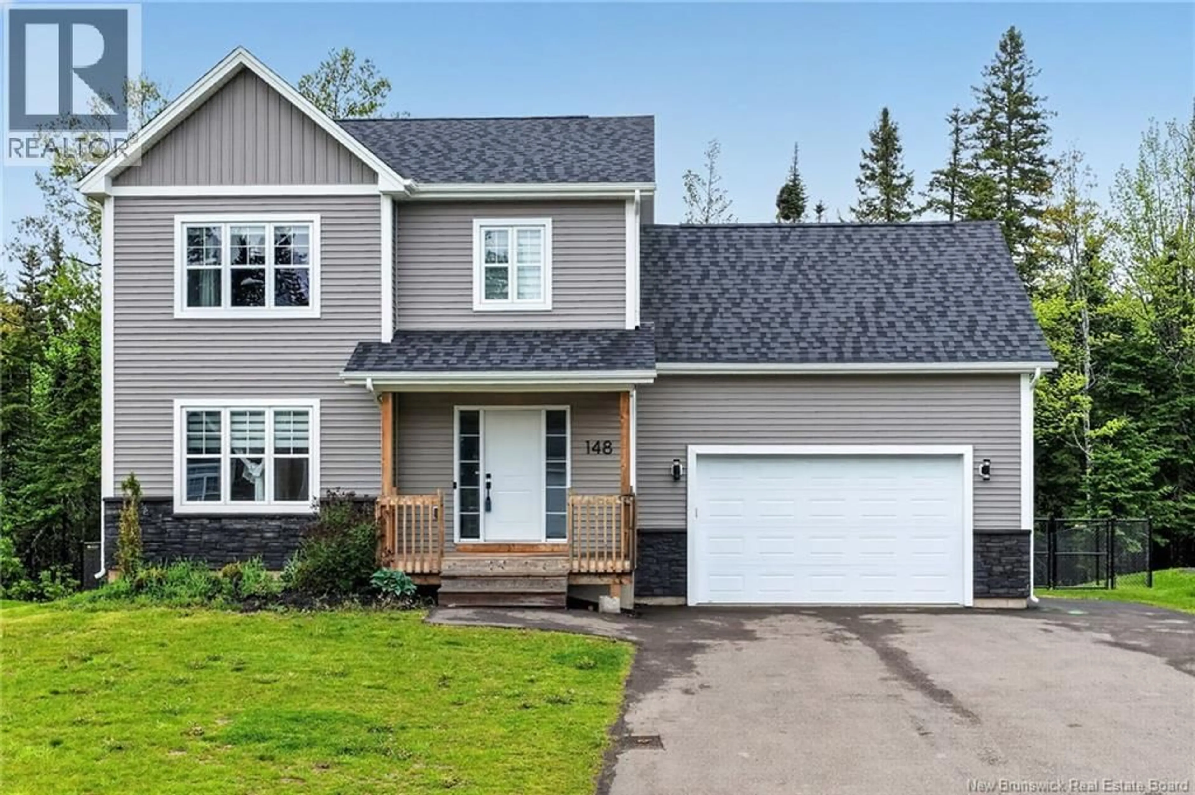 Home with vinyl exterior material, street for 148 DES ELEVES, Dieppe New Brunswick E1A4V6