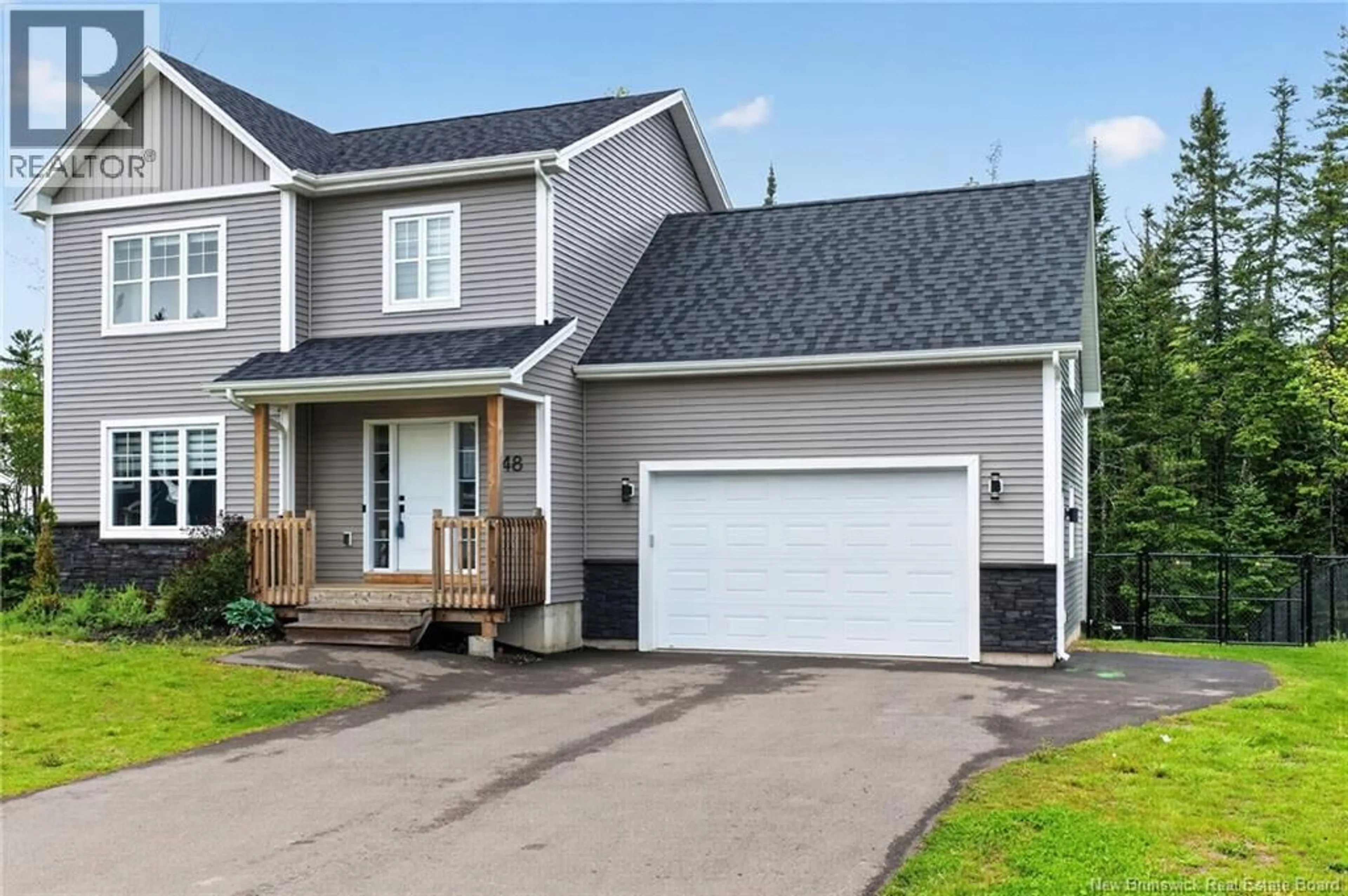 Home with vinyl exterior material, street for 148 DES ELEVES, Dieppe New Brunswick E1A4V6