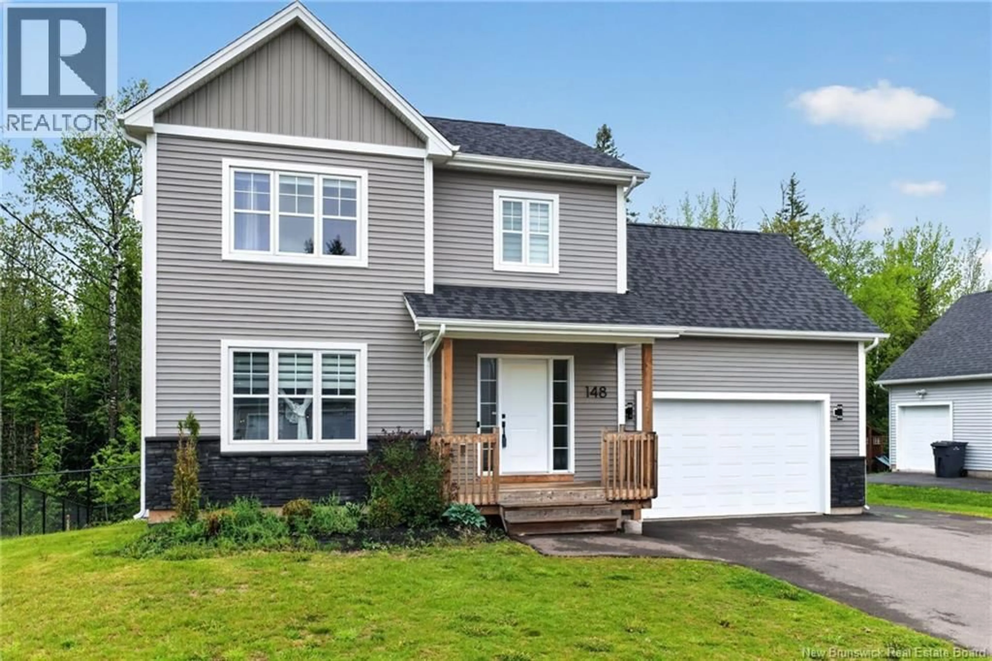 Home with vinyl exterior material, street for 148 DES ELEVES, Dieppe New Brunswick E1A4V6