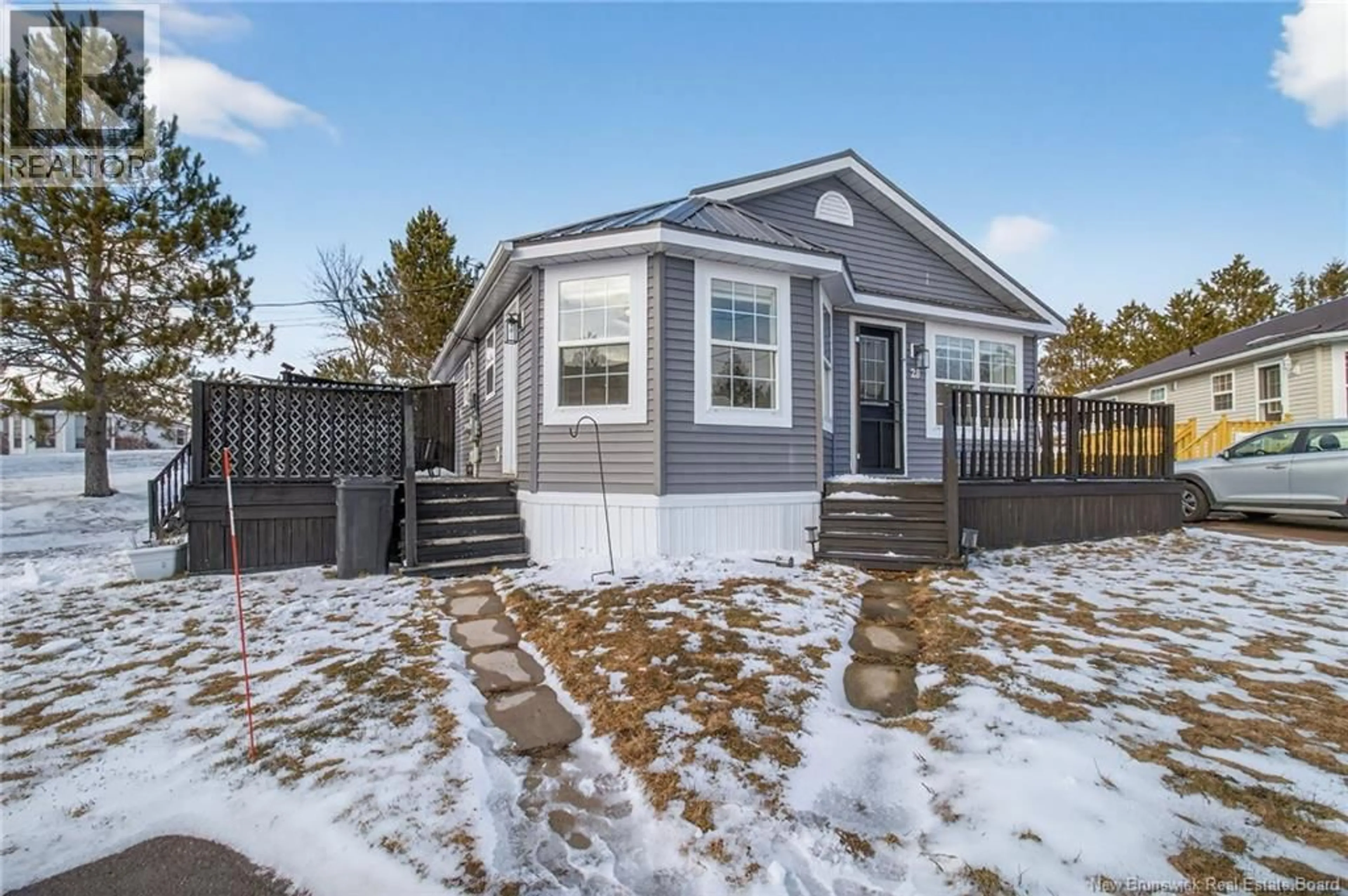 Home with vinyl exterior material, street for 28 JESSICA LANE, Dieppe New Brunswick E1A7S6