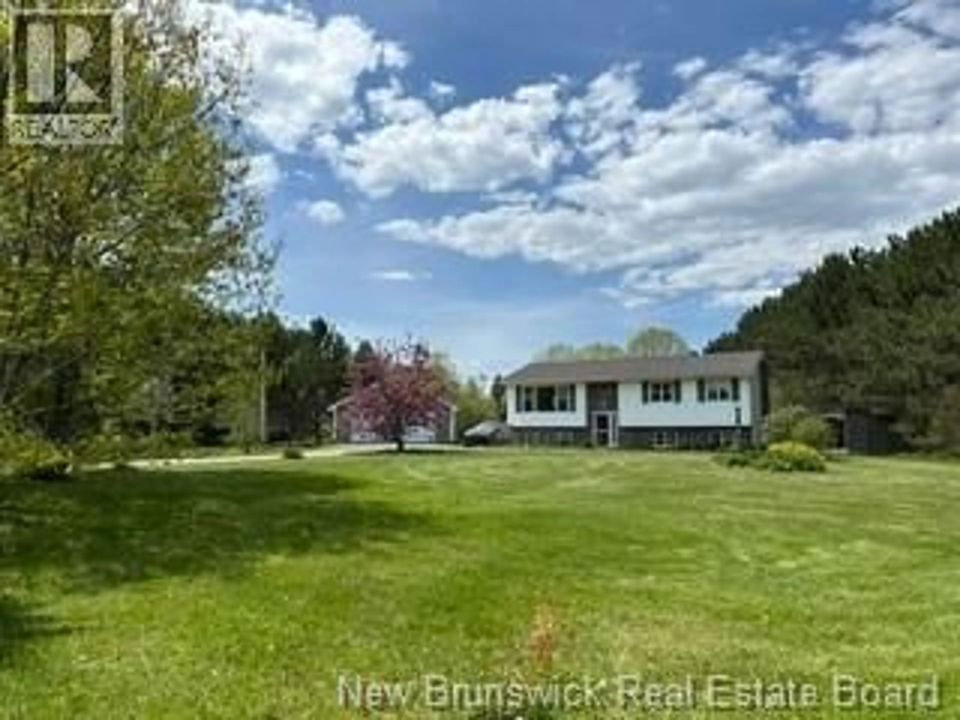 A pic from outside/outdoor area/front of a property/back of a property/a pic from drone, water/lake/river/ocean view for 20 SHERWOOD DRIVE, Miramichi New Brunswick E1V4N4