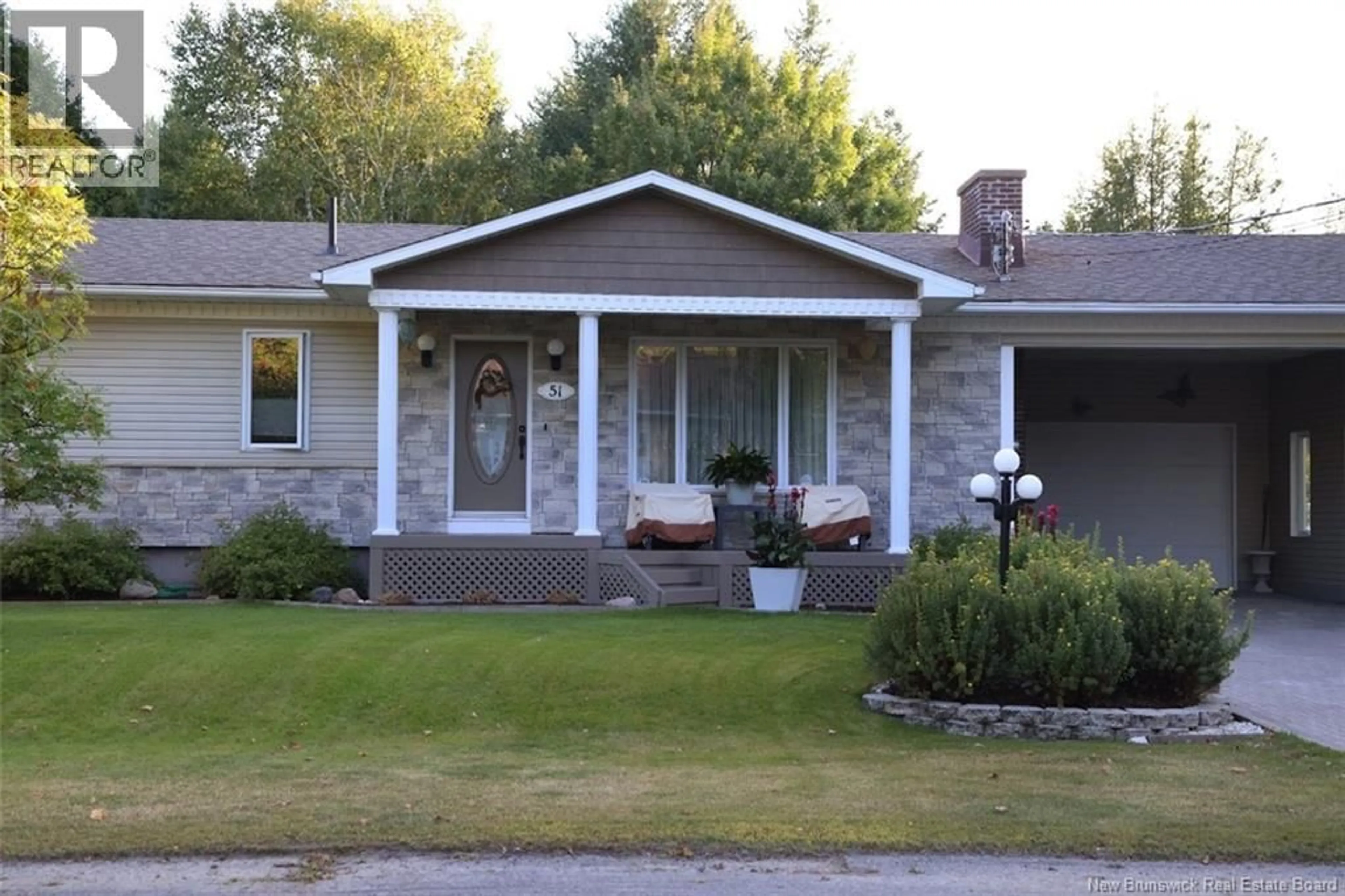 Home with vinyl exterior material, street for 51 MADAWASKA STREET, Saint-Jacques New Brunswick E7B1L6