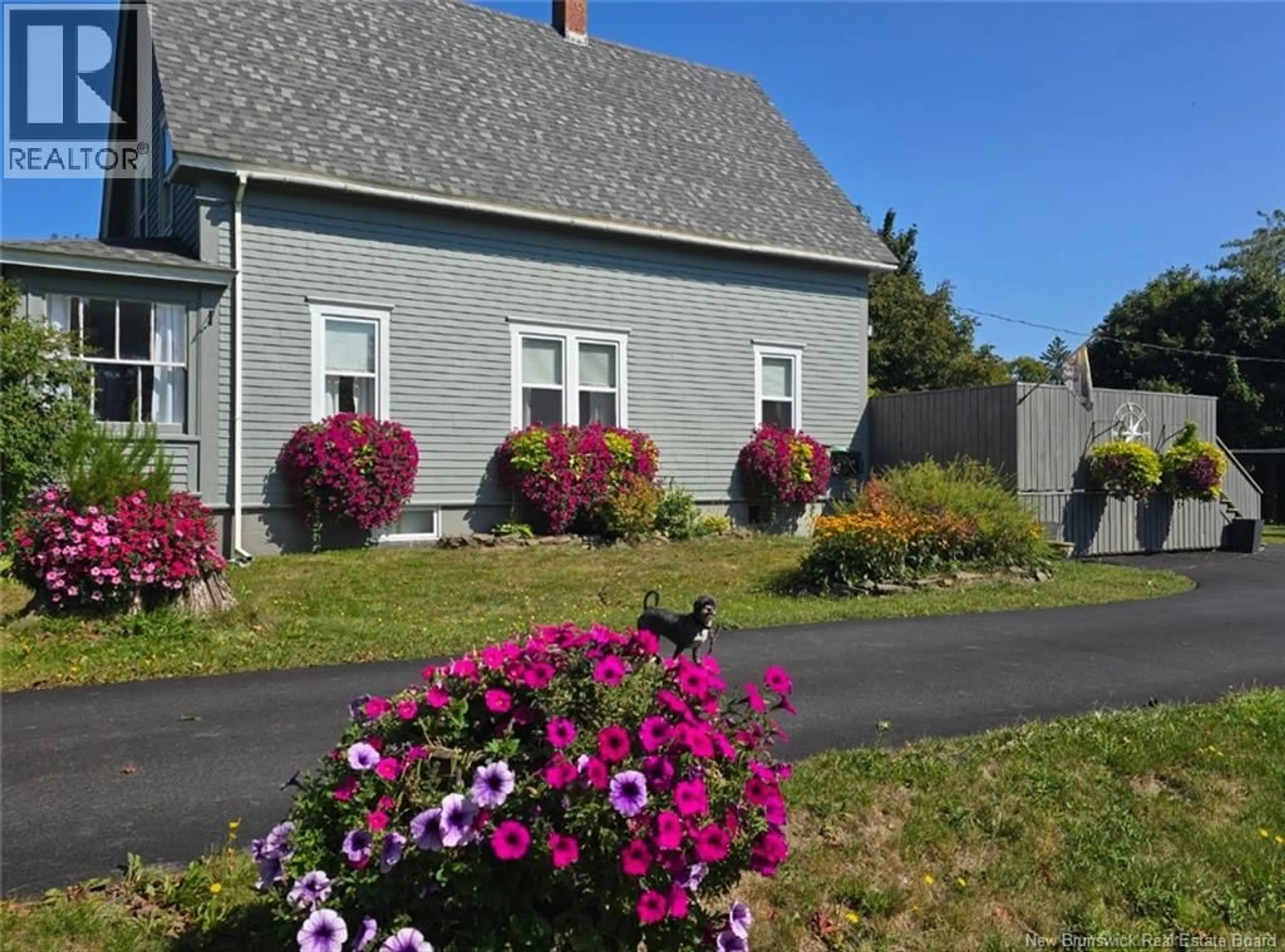 A pic from outside/outdoor area/front of a property/back of a property/a pic from drone, street for 541 ROUTE 776, Grand Manan New Brunswick E5G2C8