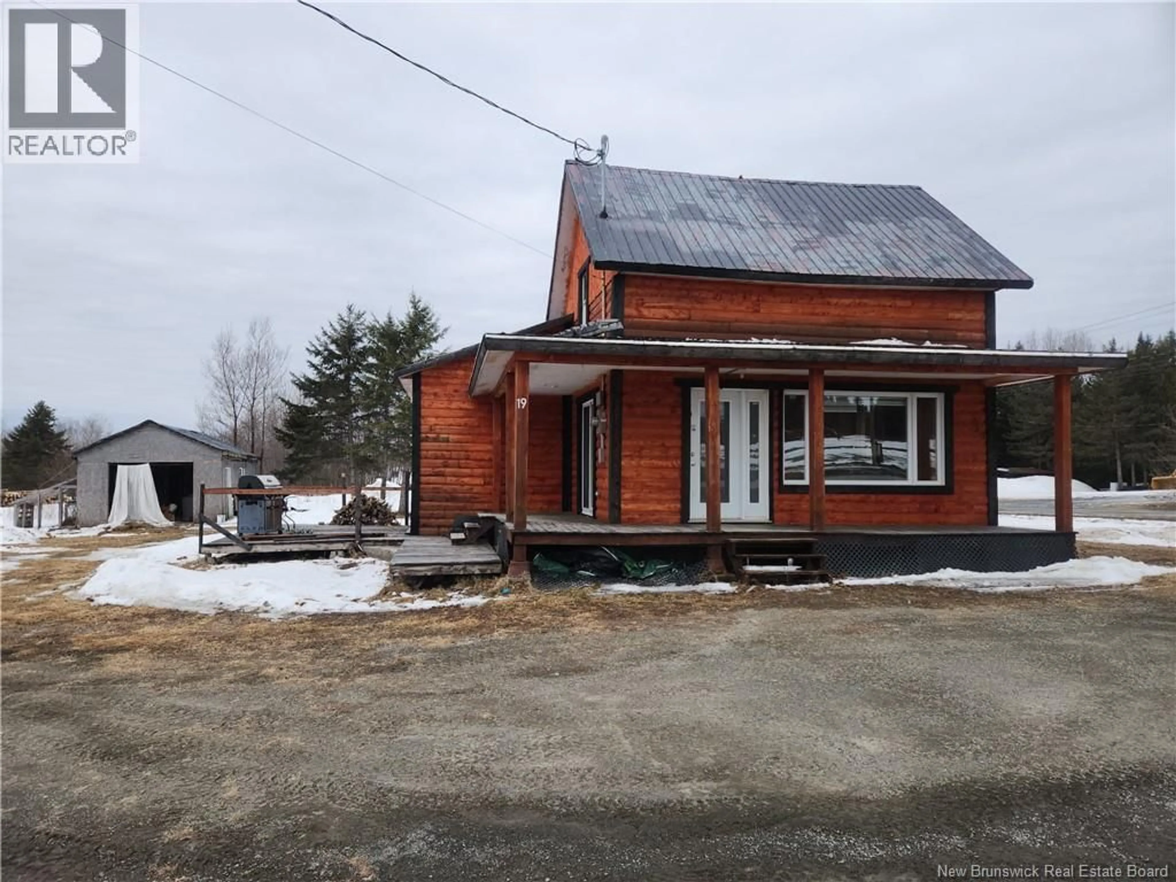 A pic from outside/outdoor area/front of a property/back of a property/a pic from drone, street for 19 ROUTE 265, Kedgwick River New Brunswick E8B1P9