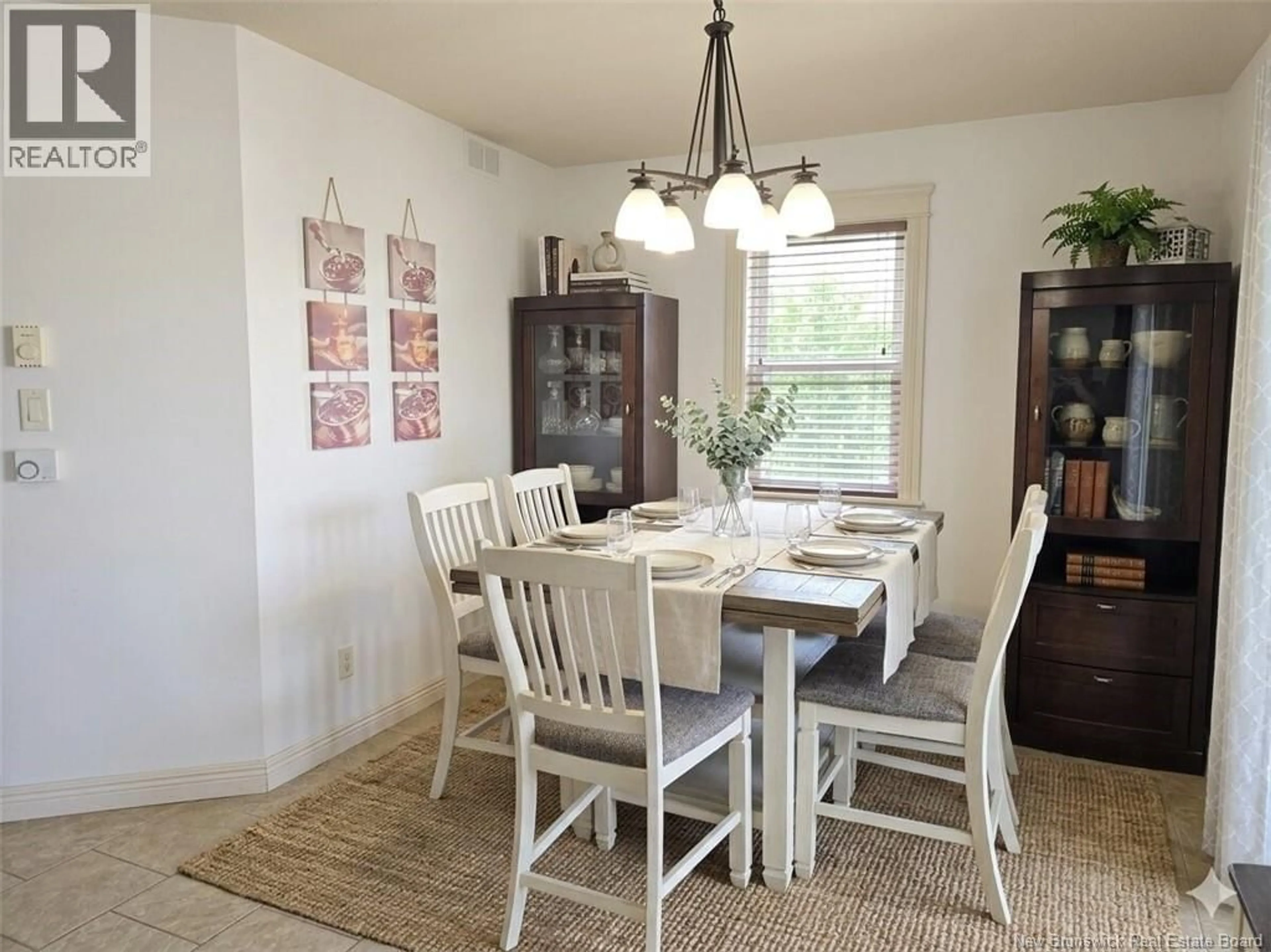 Dining room, wood/laminate floor for 922 BERNARD STREET, Dieppe New Brunswick E1A5A4