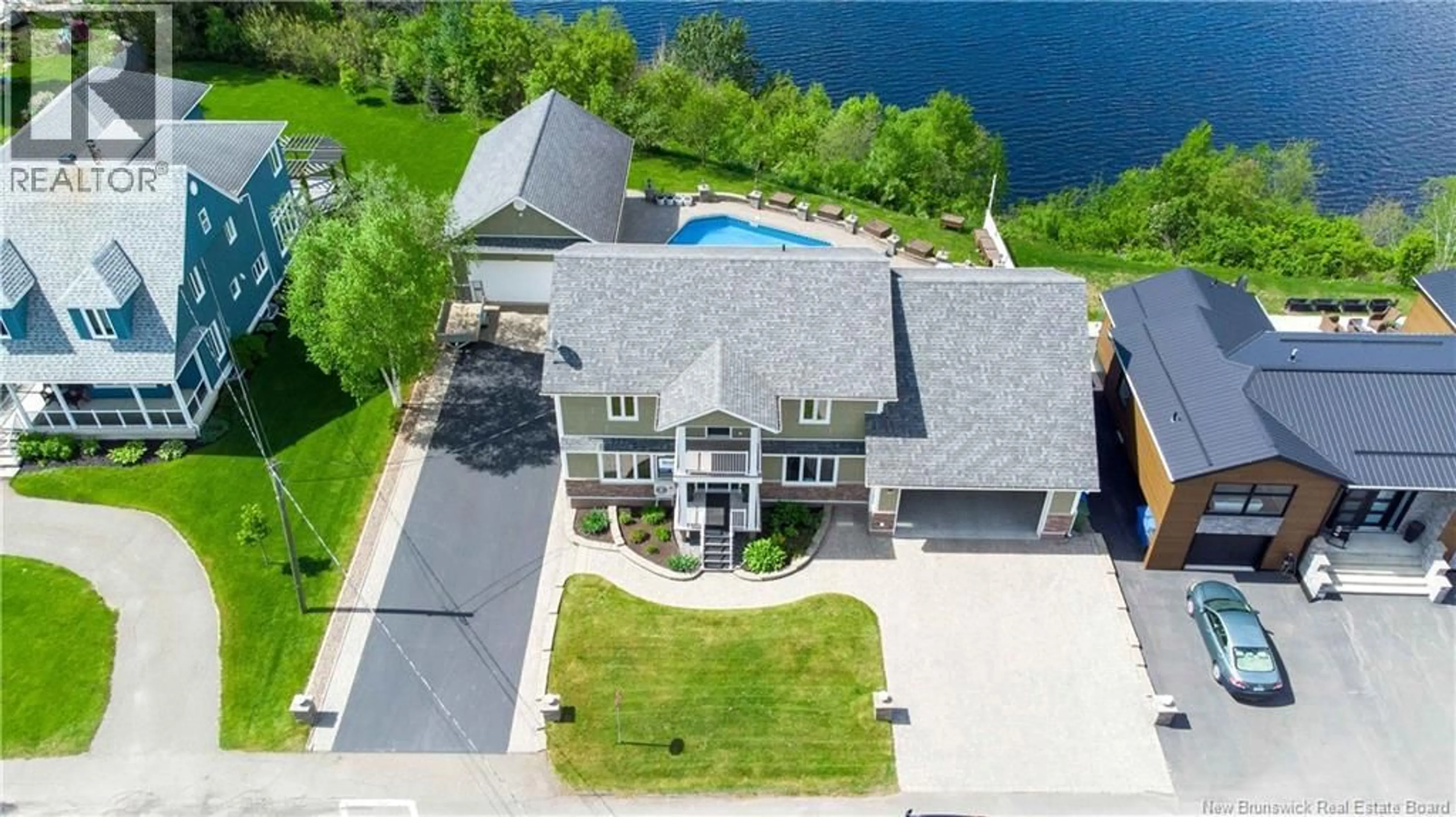 A pic from outside/outdoor area/front of a property/back of a property/a pic from drone, water/lake/river/ocean view for 380 FRONT STREET, Grand Falls New Brunswick E3Z2S6