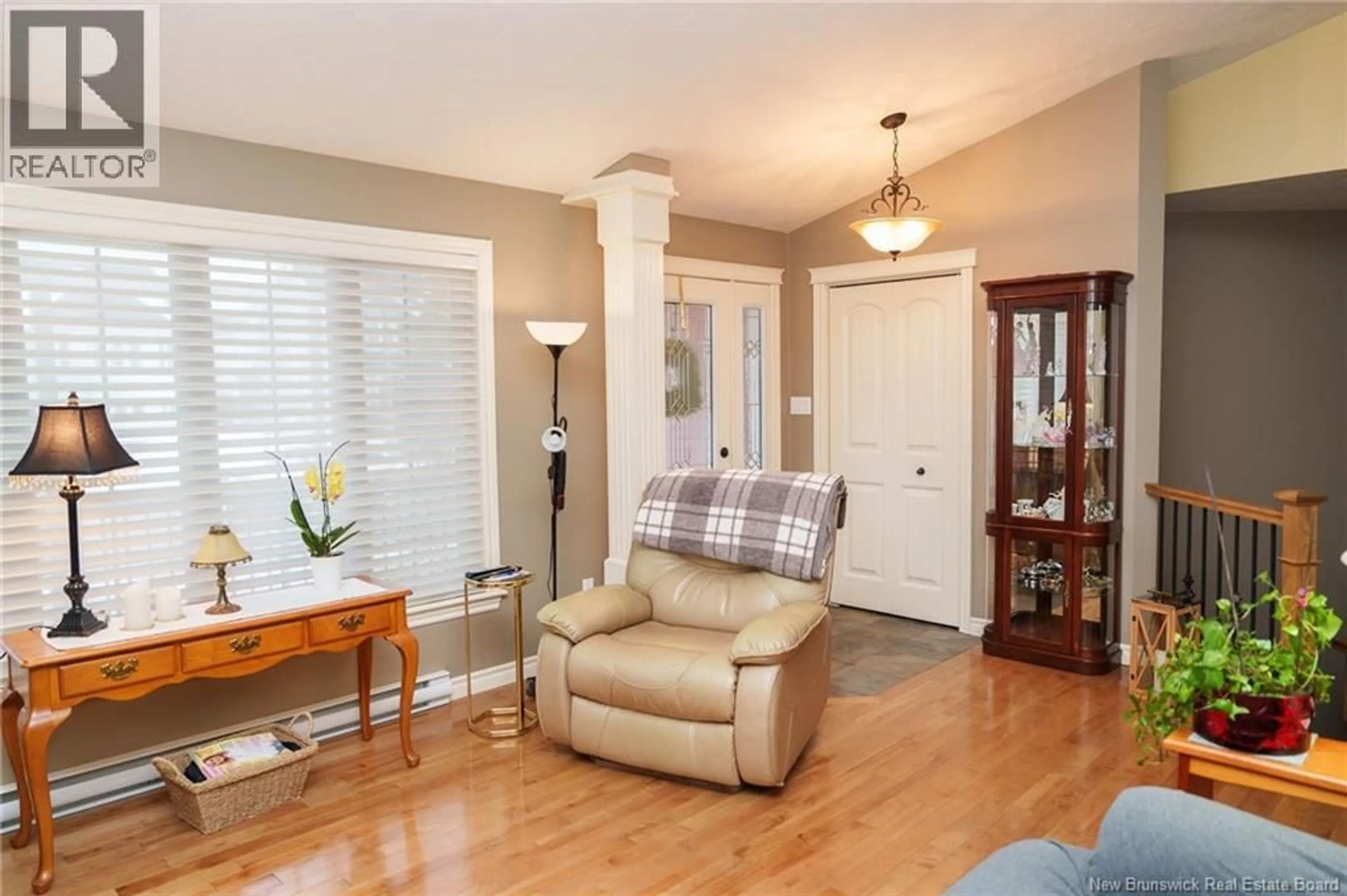 Living room with furniture, wood/laminate floor for 12 MELBA STREET, Moncton New Brunswick E1A0V8