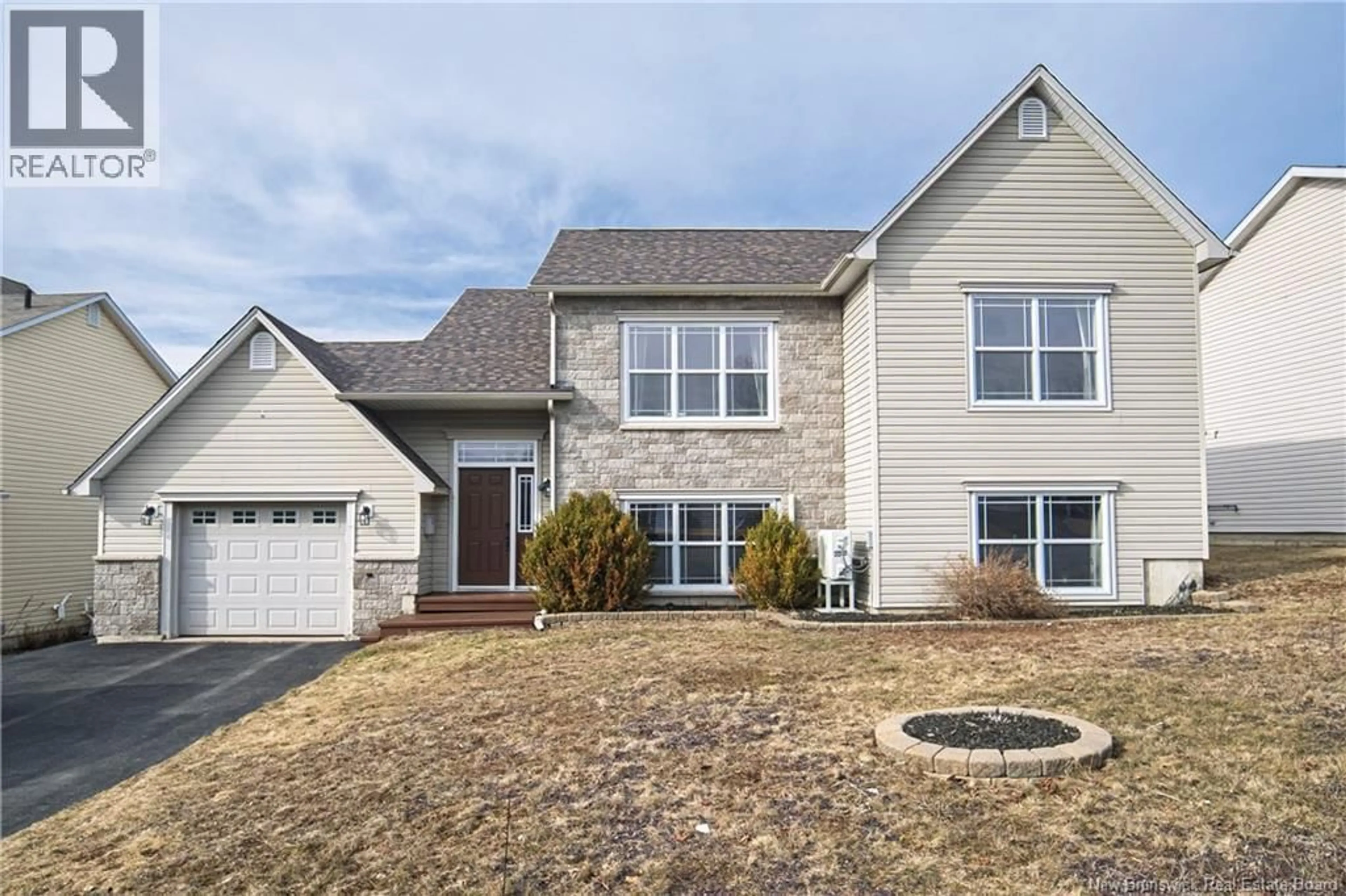 Home with vinyl exterior material, street for 27 HALLIHAN DRIVE, Oromocto New Brunswick E2V0C2