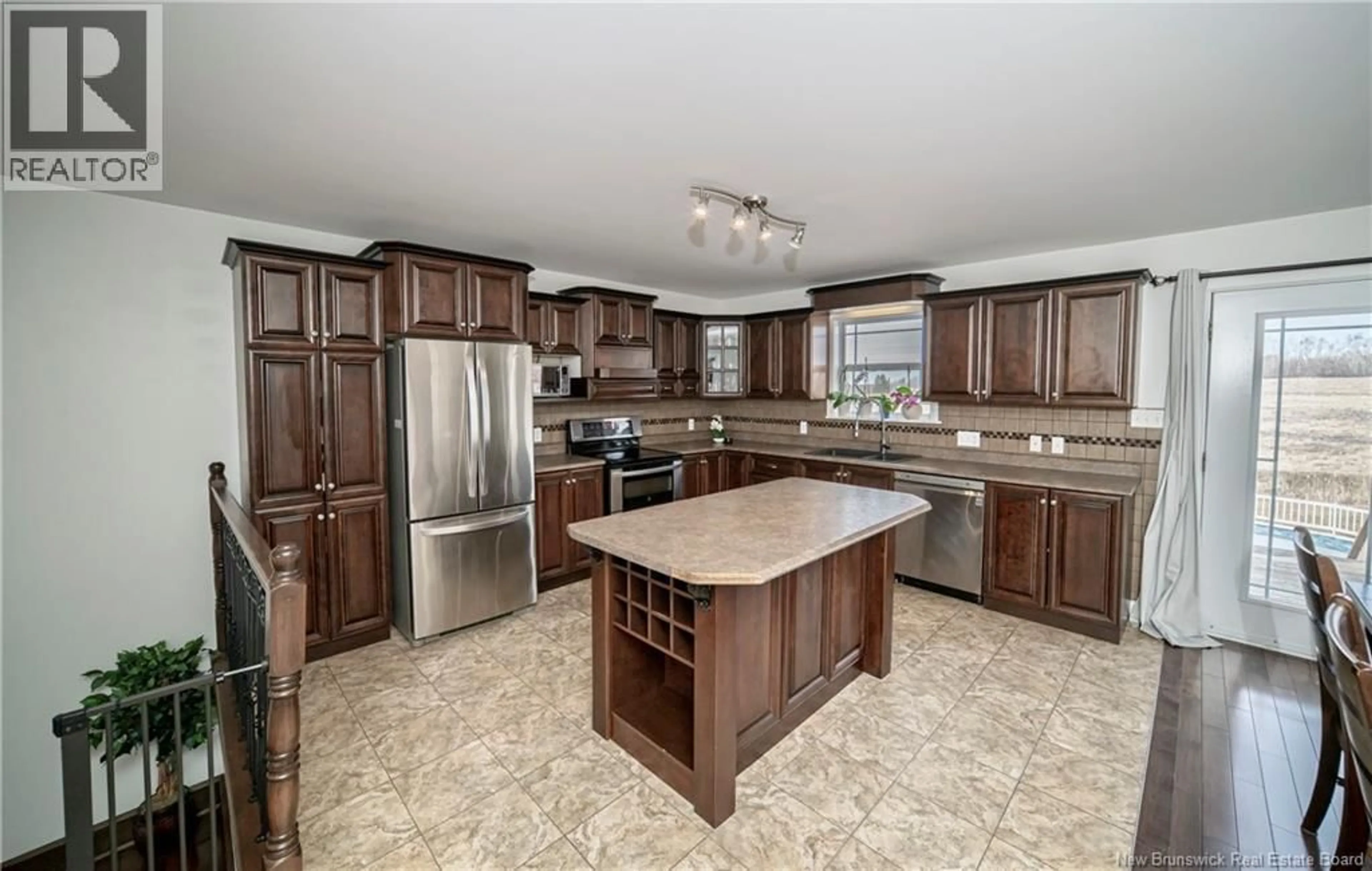 Open concept kitchen, ceramic/tile floor for 27 HALLIHAN DRIVE, Oromocto New Brunswick E2V0C2