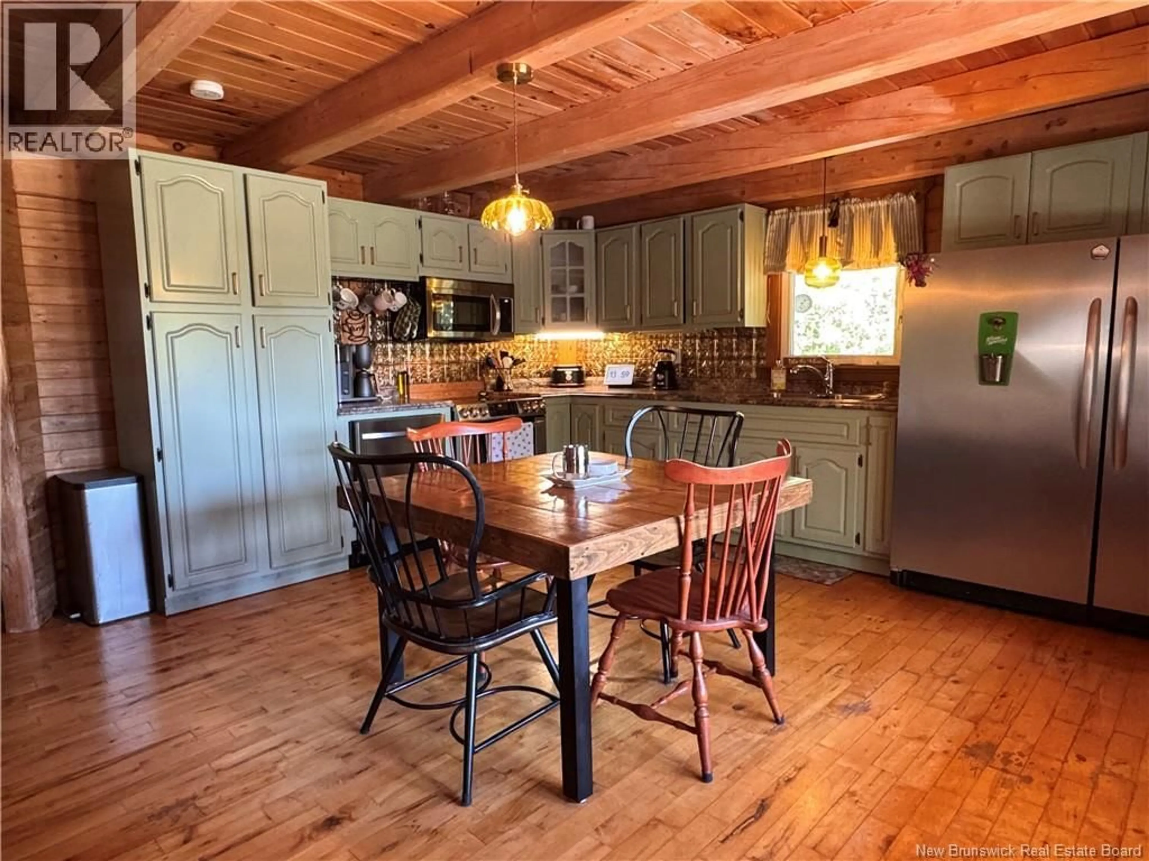 Open concept kitchen, wood/laminate floor for 857 ROUTE 160, Allardville New Brunswick E8L1L1