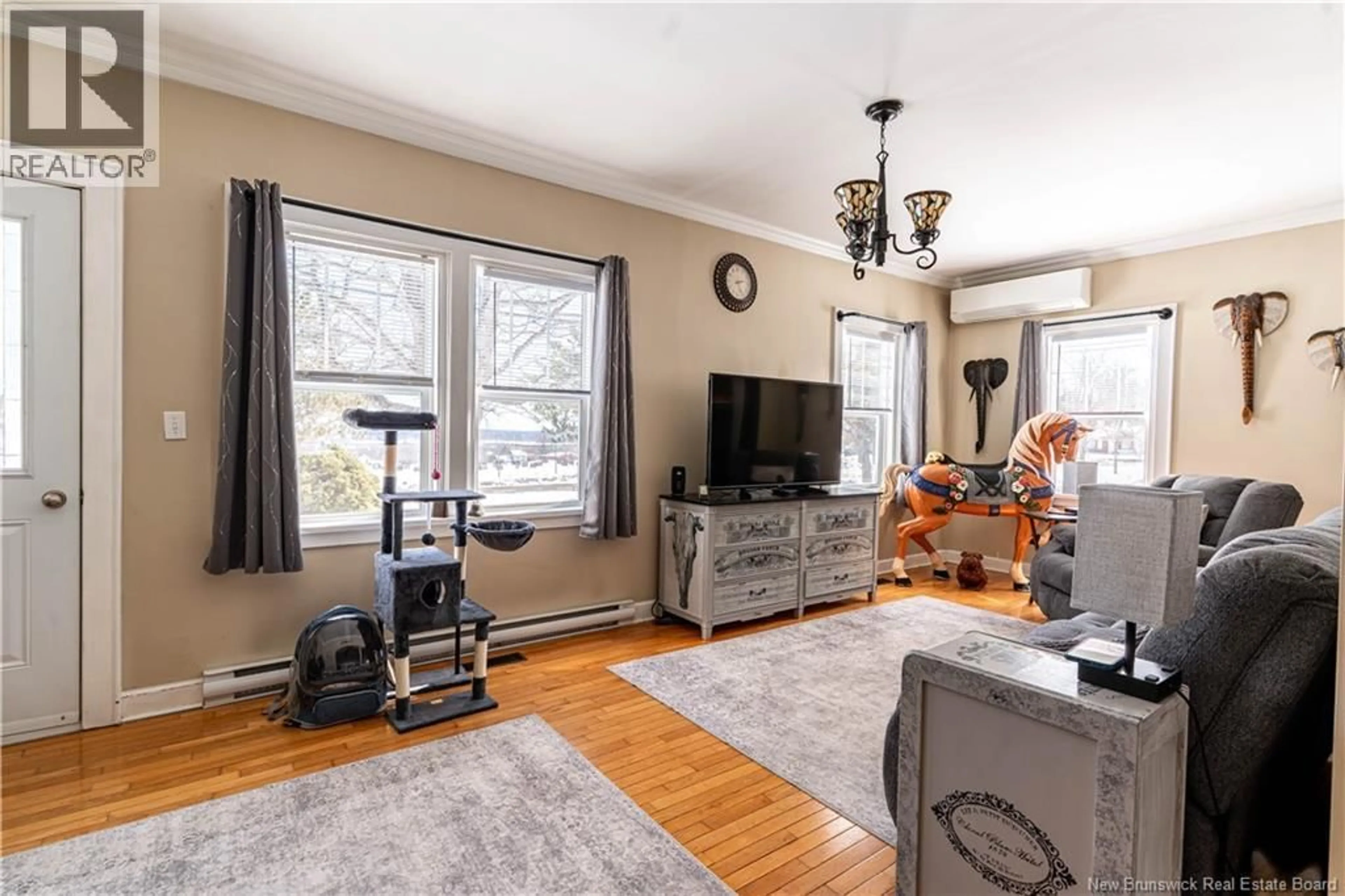 Living room with furniture, unknown for 113 GRANDVIEW AVENUE, Miramichi New Brunswick E1V1C8