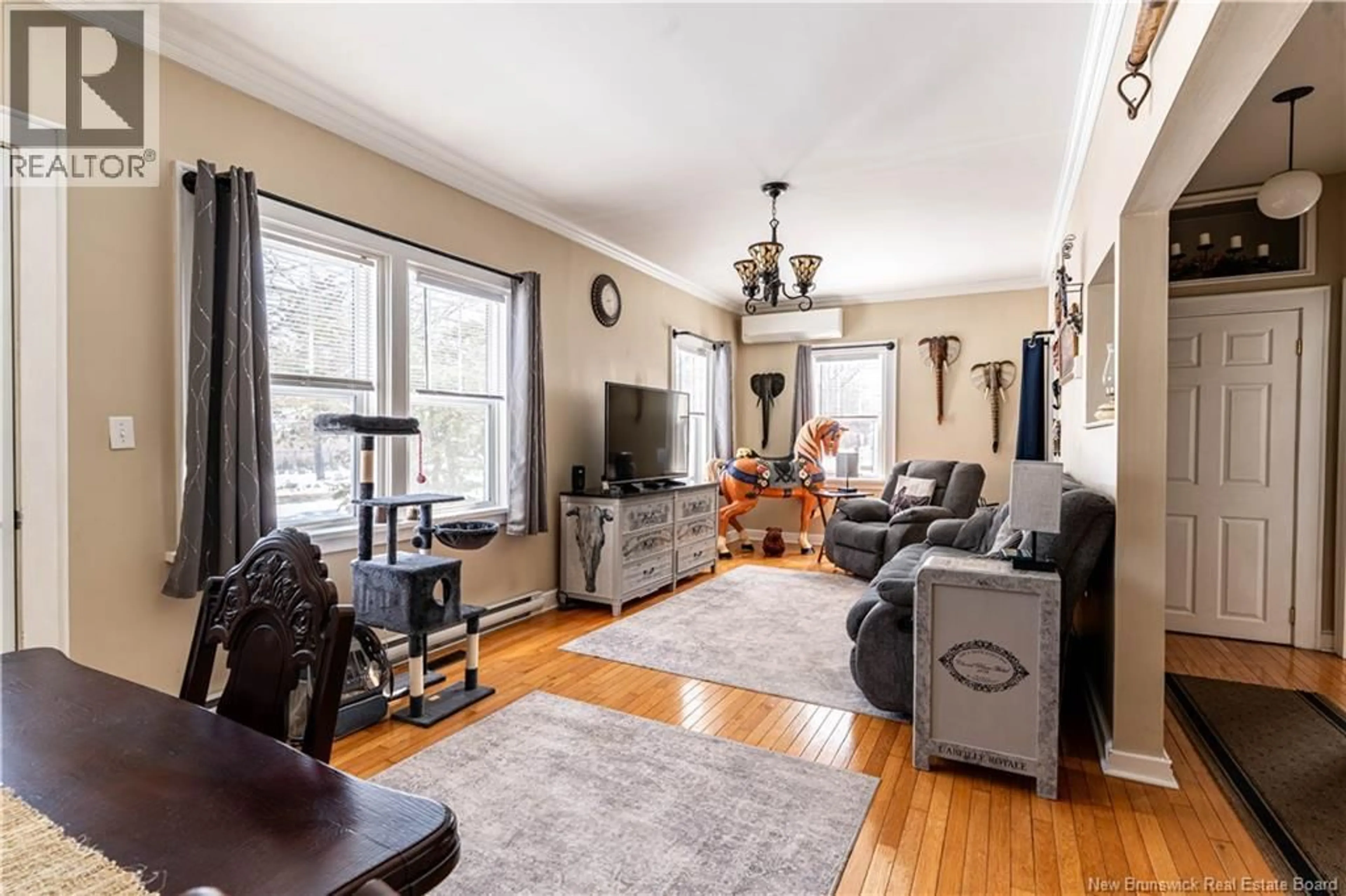 Living room with furniture, unknown for 113 GRANDVIEW AVENUE, Miramichi New Brunswick E1V1C8