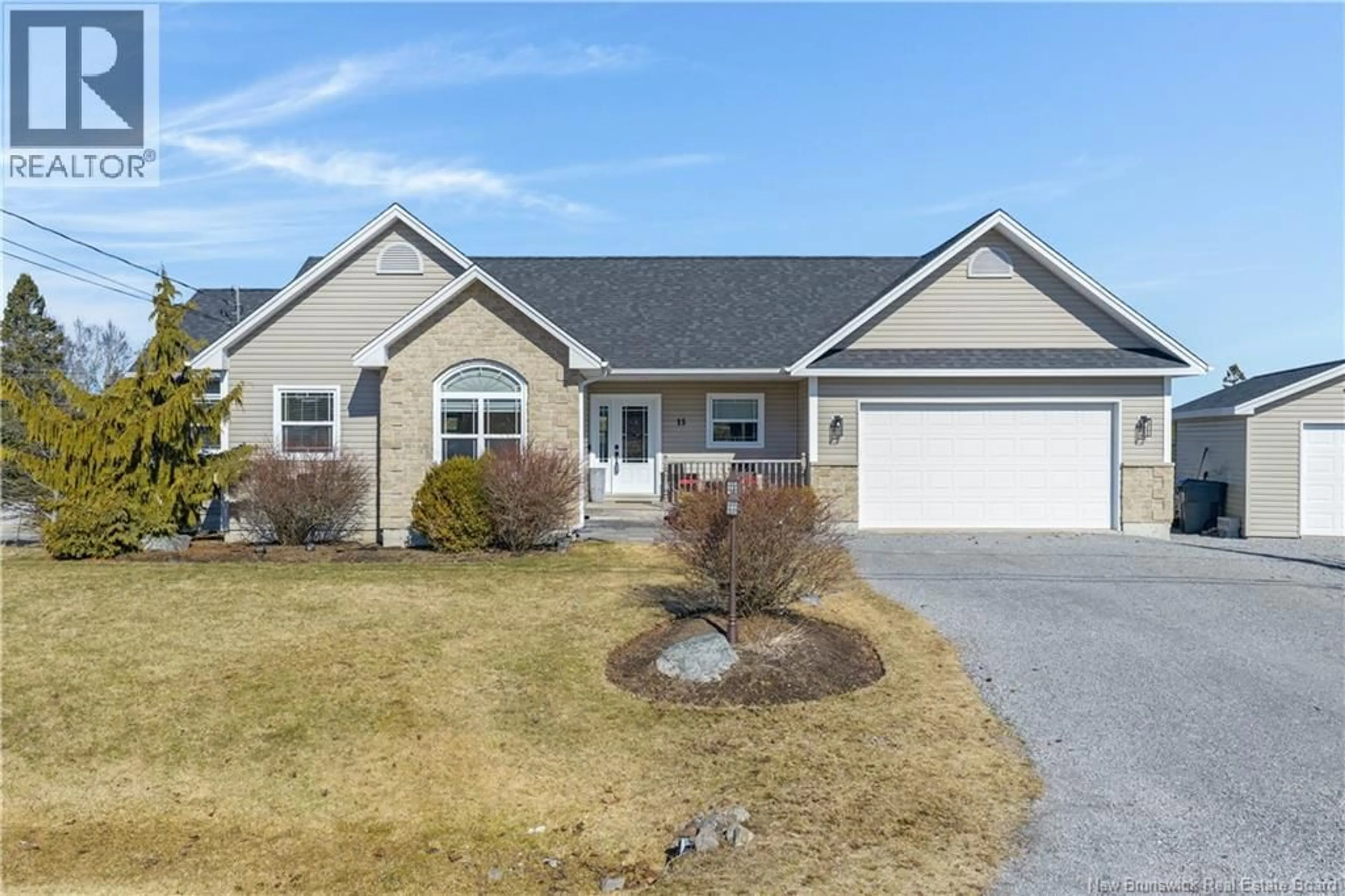 Home with vinyl exterior material, street for 15 TRILLIUM DRIVE, Quispamsis New Brunswick E2E0K9