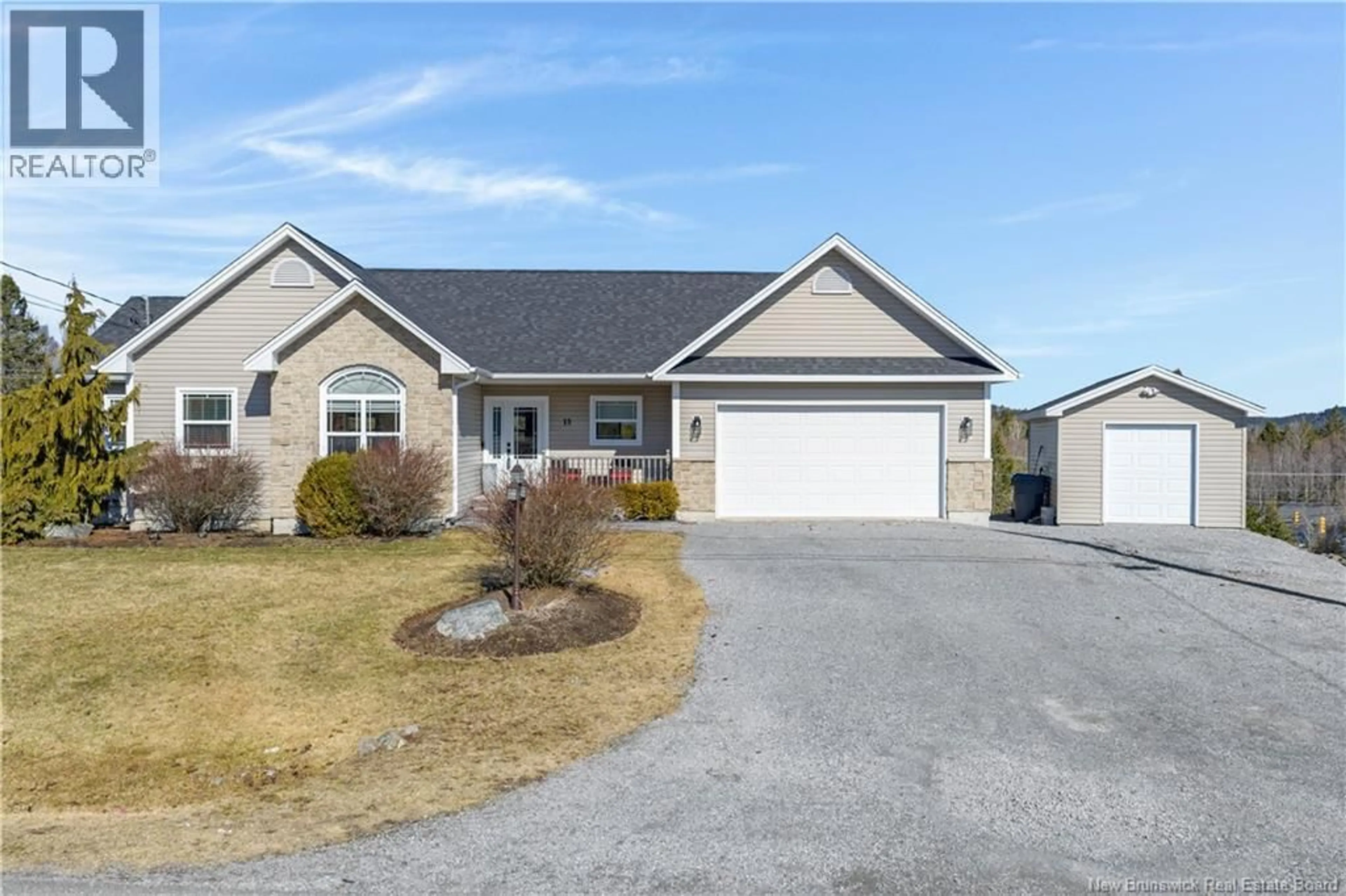 Home with vinyl exterior material, street for 15 TRILLIUM DRIVE, Quispamsis New Brunswick E2E0K9