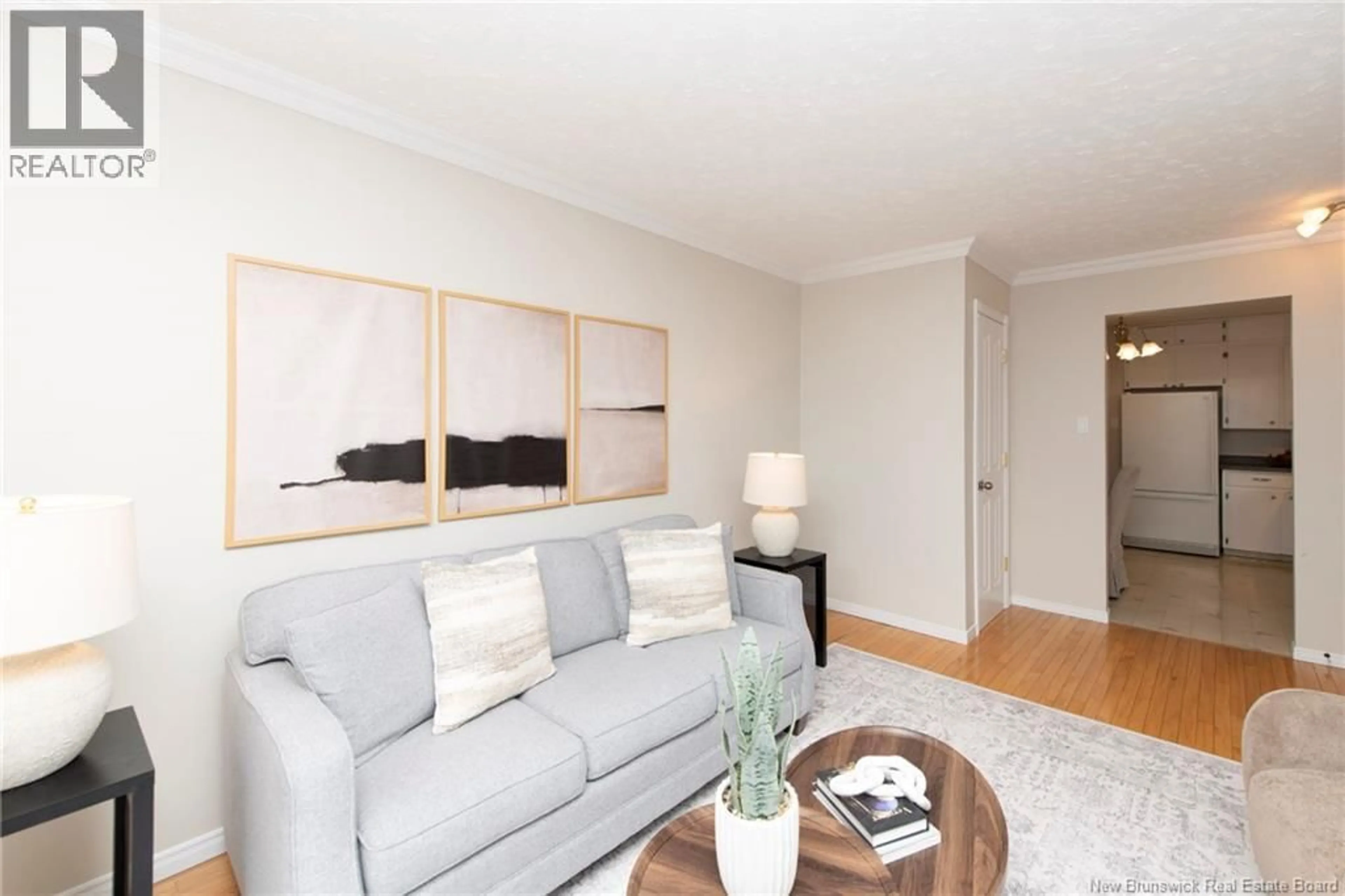 Living room with furniture, wood/laminate floor for 160 SNOW AVENUE, Moncton New Brunswick E1C8B4