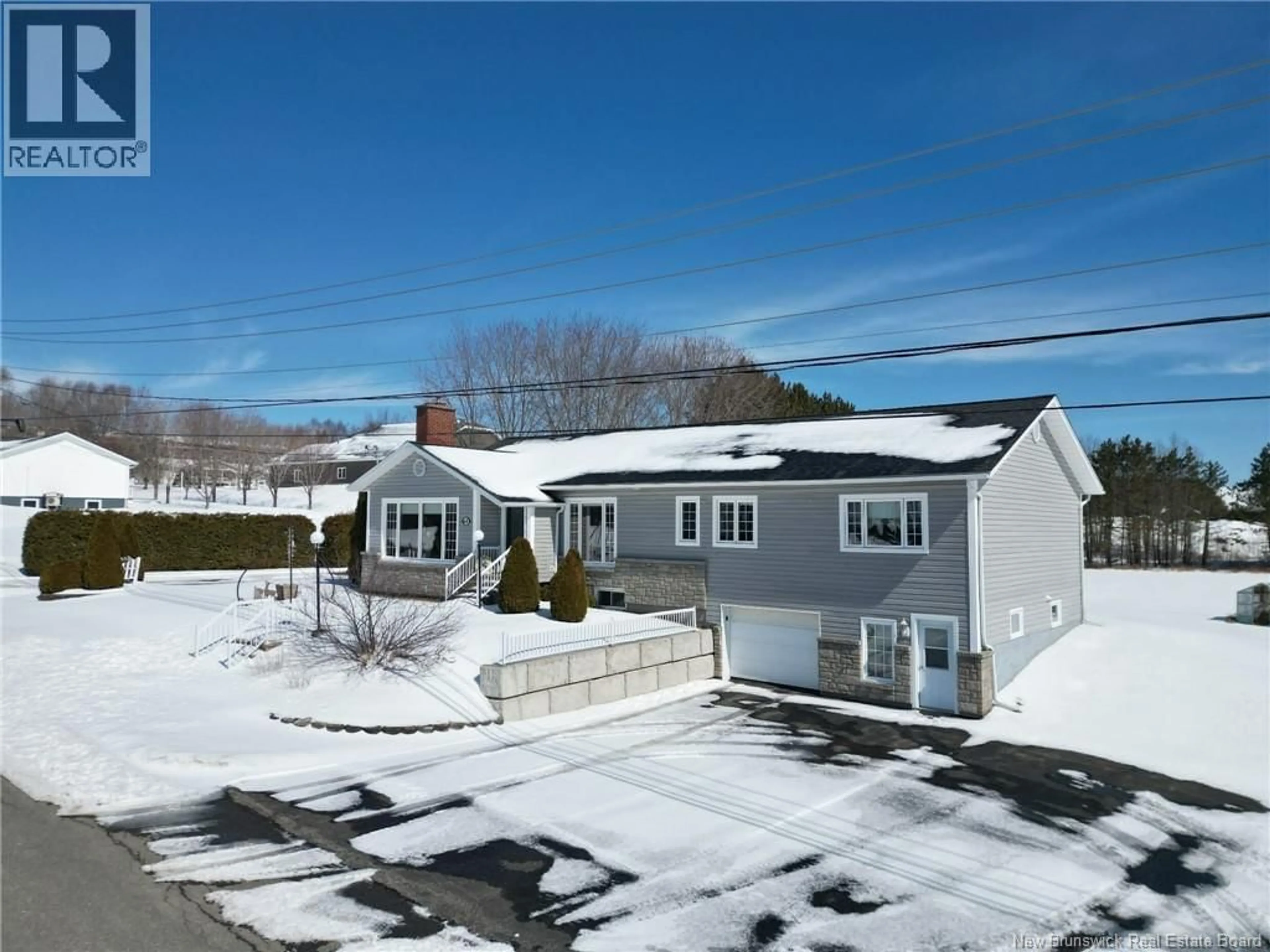 A pic from outside/outdoor area/front of a property/back of a property/a pic from drone, street for 68 THERIAULT STREET, Grand Falls New Brunswick E3Y1B5