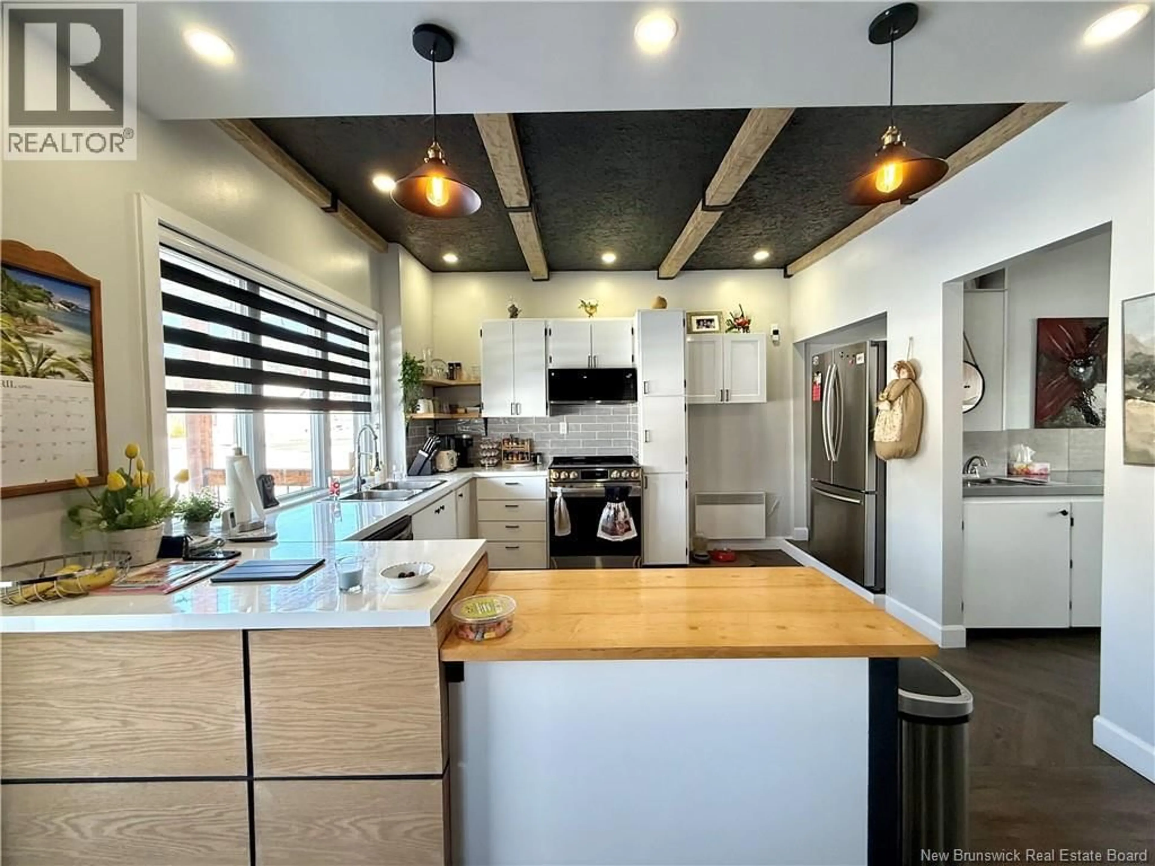 Open concept kitchen, wood/laminate floor for 2116 COMMERCIALE STREET, Saint-François-de-Madawaska New Brunswick E7A1B4