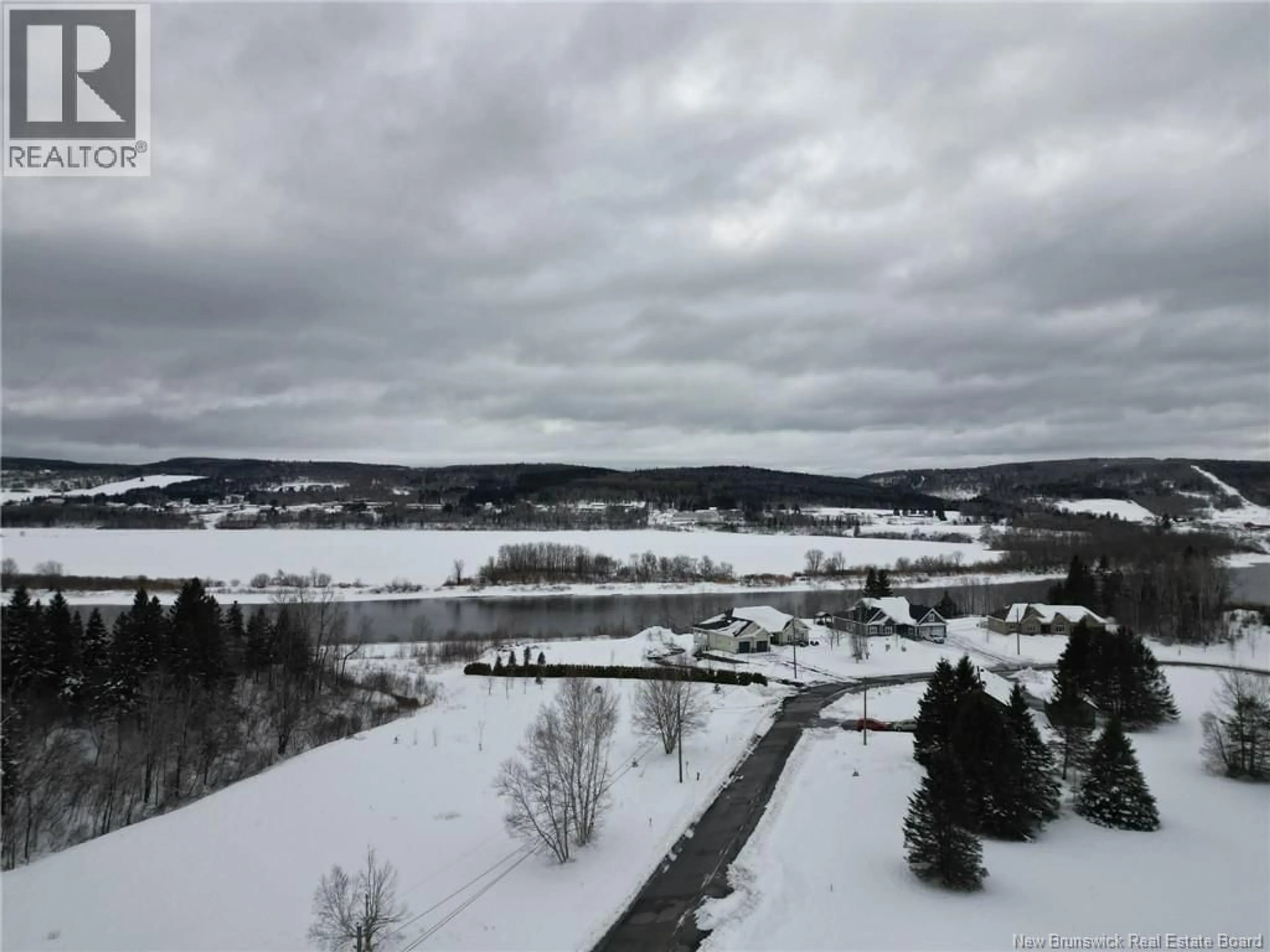 A pic from outside/outdoor area/front of a property/back of a property/a pic from drone, water/lake/river/ocean view for 17 RENAY STREET, Saint-Basile New Brunswick E7C0A7