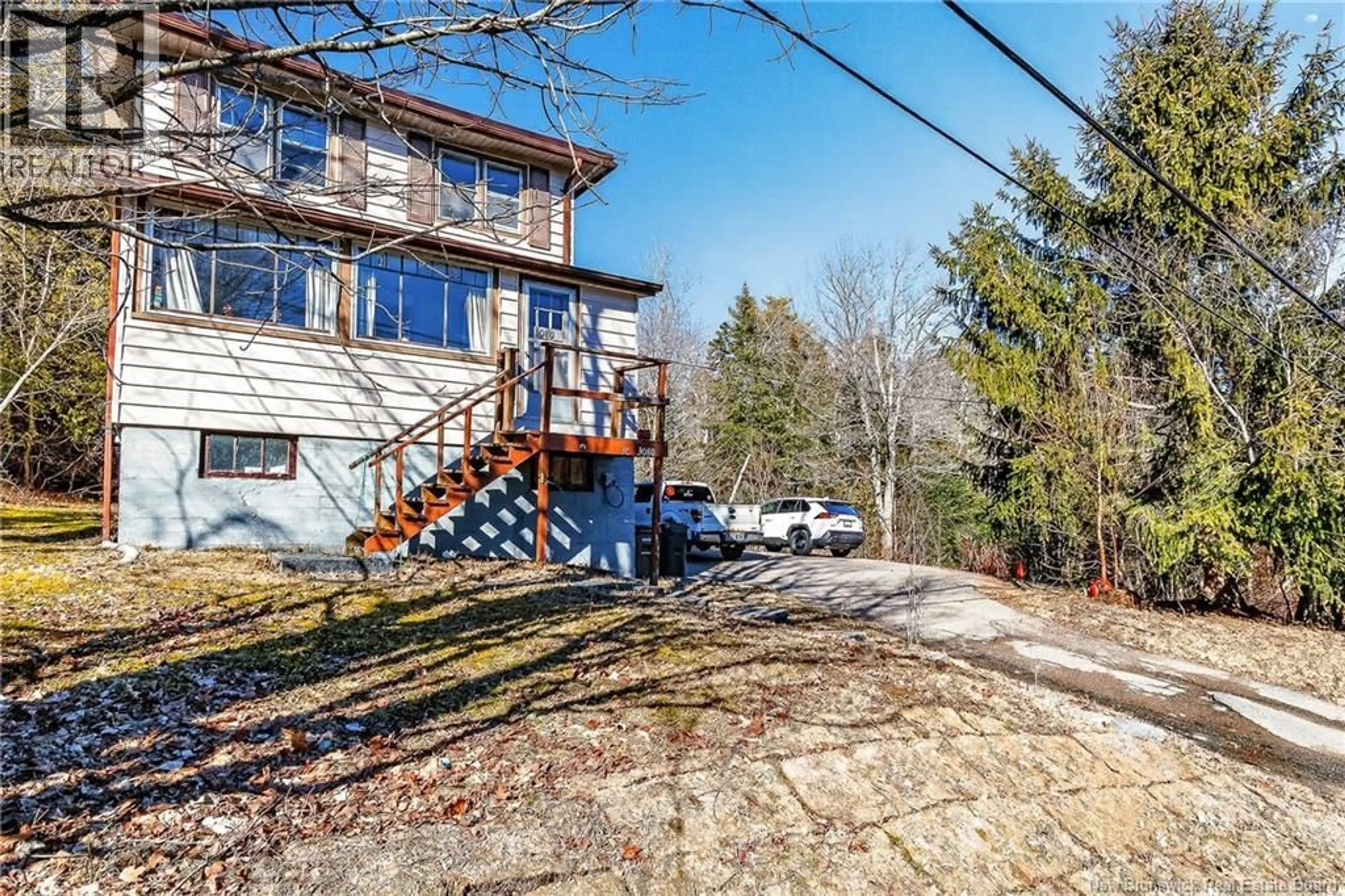 A pic from outside/outdoor area/front of a property/back of a property/a pic from drone, unknown for 3080 WESTFIELD ROAD, Saint John New Brunswick E2M6T9