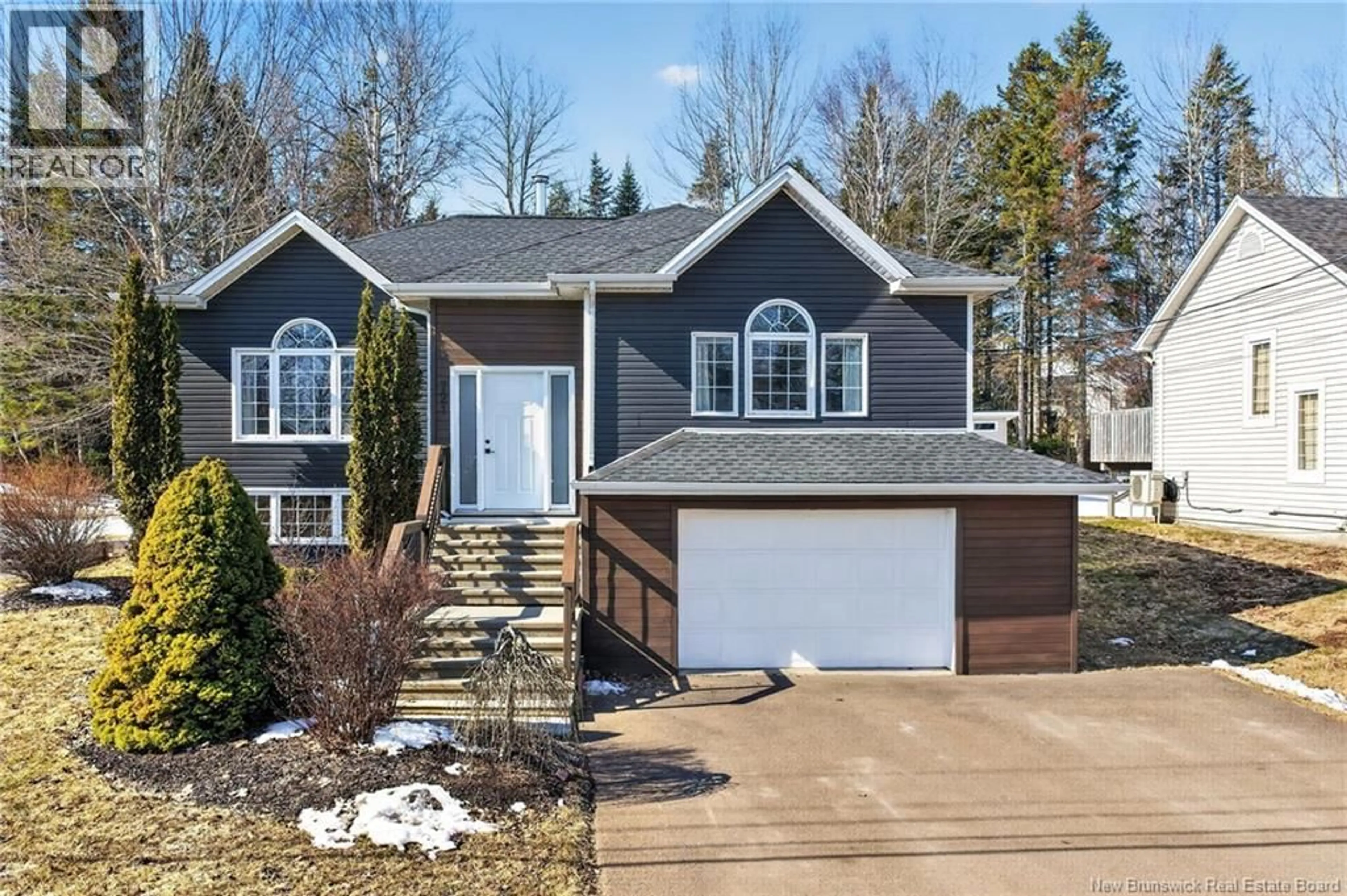 Home with vinyl exterior material, street for 721 CENTRALE STREET, Dieppe New Brunswick E1A6L9