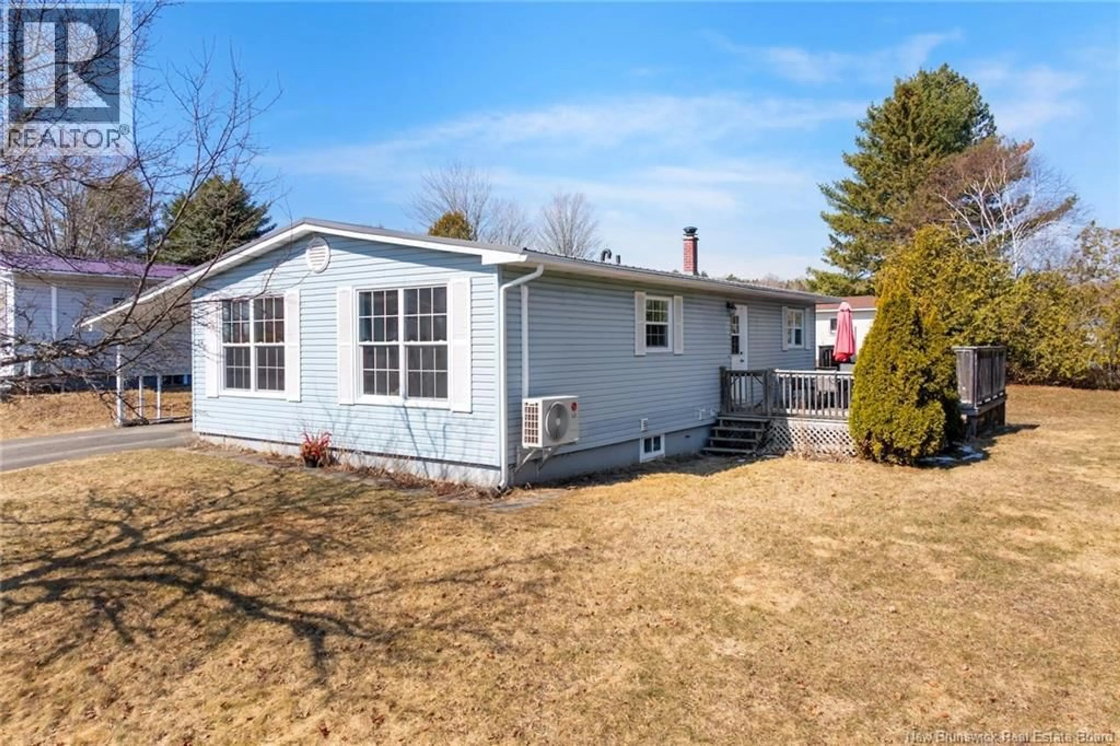 A pic from outside/outdoor area/front of a property/back of a property/a pic from drone, street for 24 MCLAREN CRESCENT, Nackawic New Brunswick E6G1C7