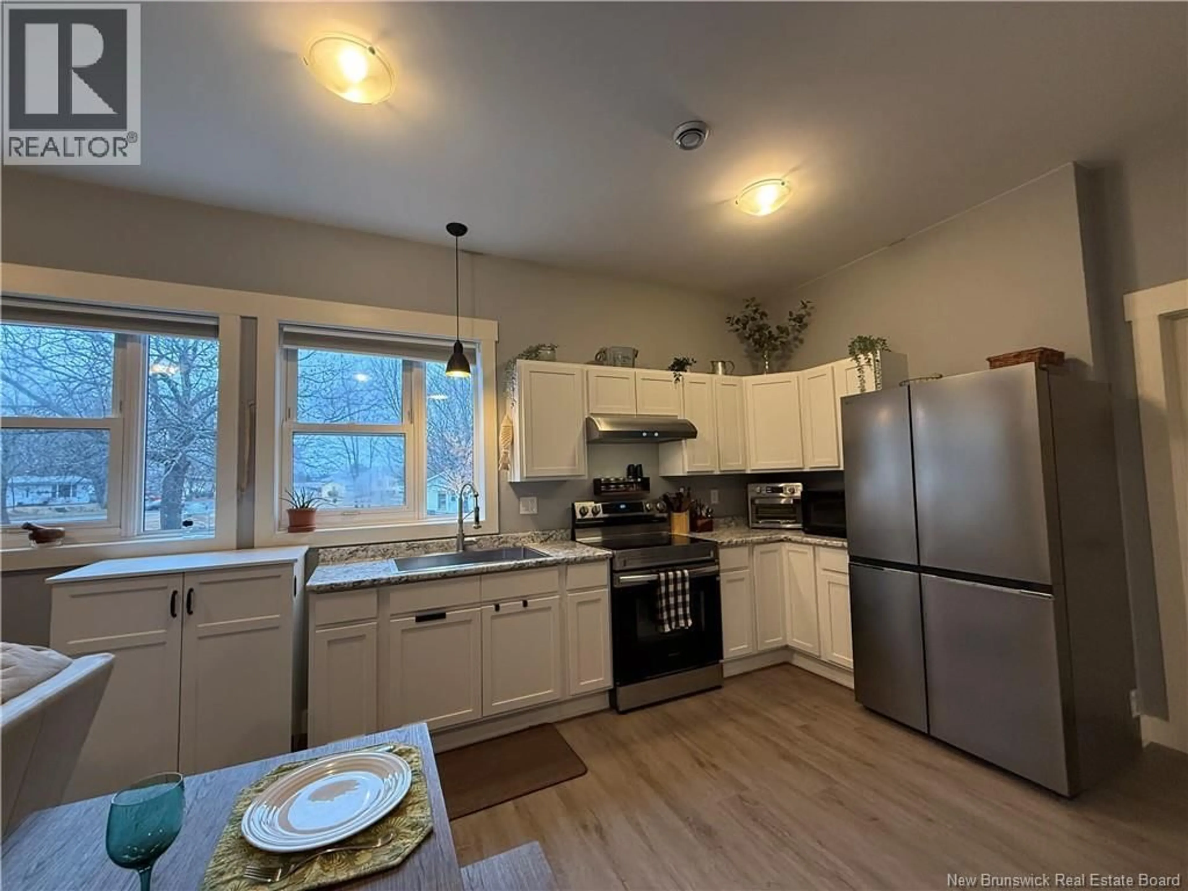 Open concept kitchen, wood/laminate floor for 98 MCNAIR DRIVE, Nackawic New Brunswick E6G1A8