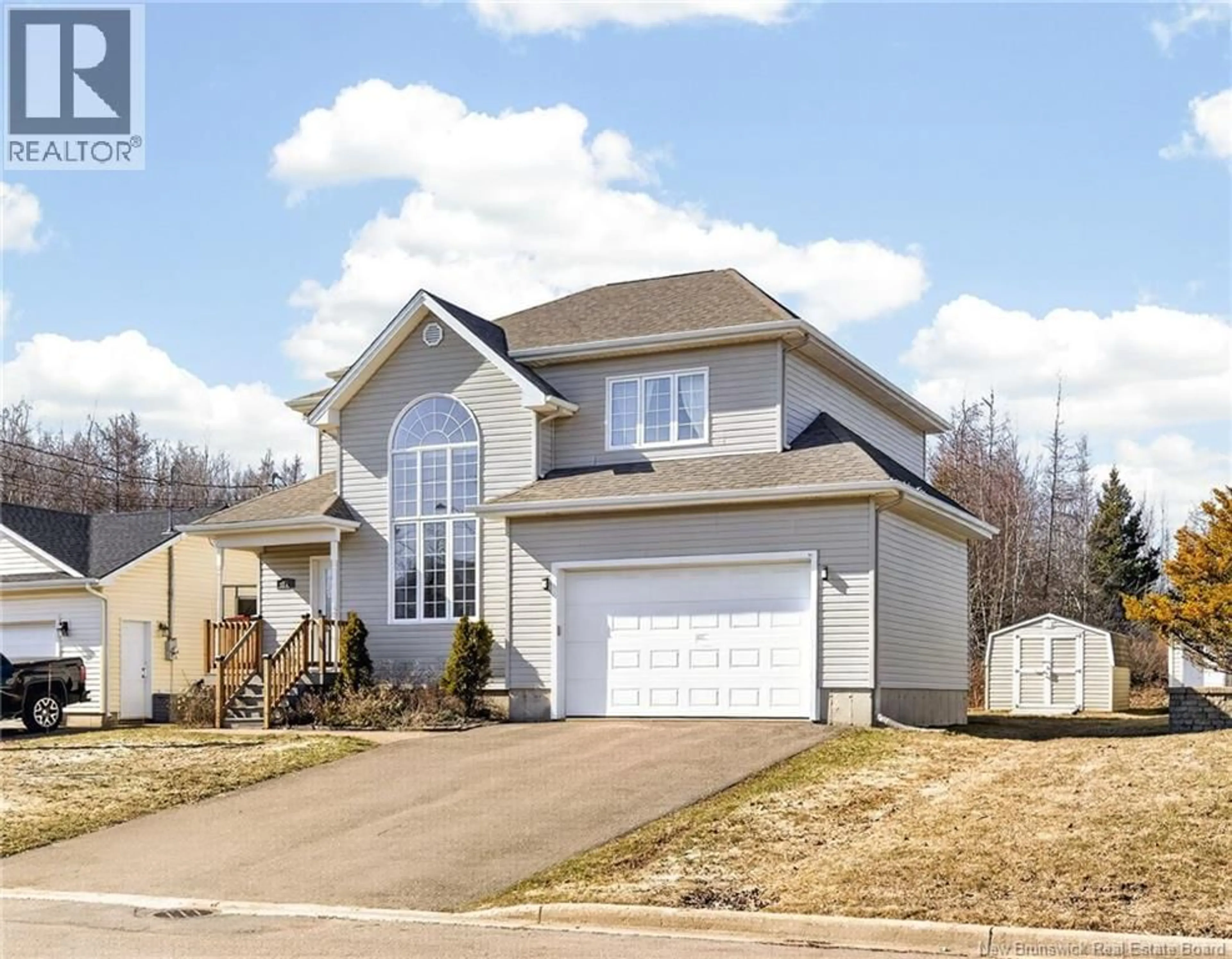 Home with vinyl exterior material, street for 75 SAVANNAH, Moncton New Brunswick E1A0J5