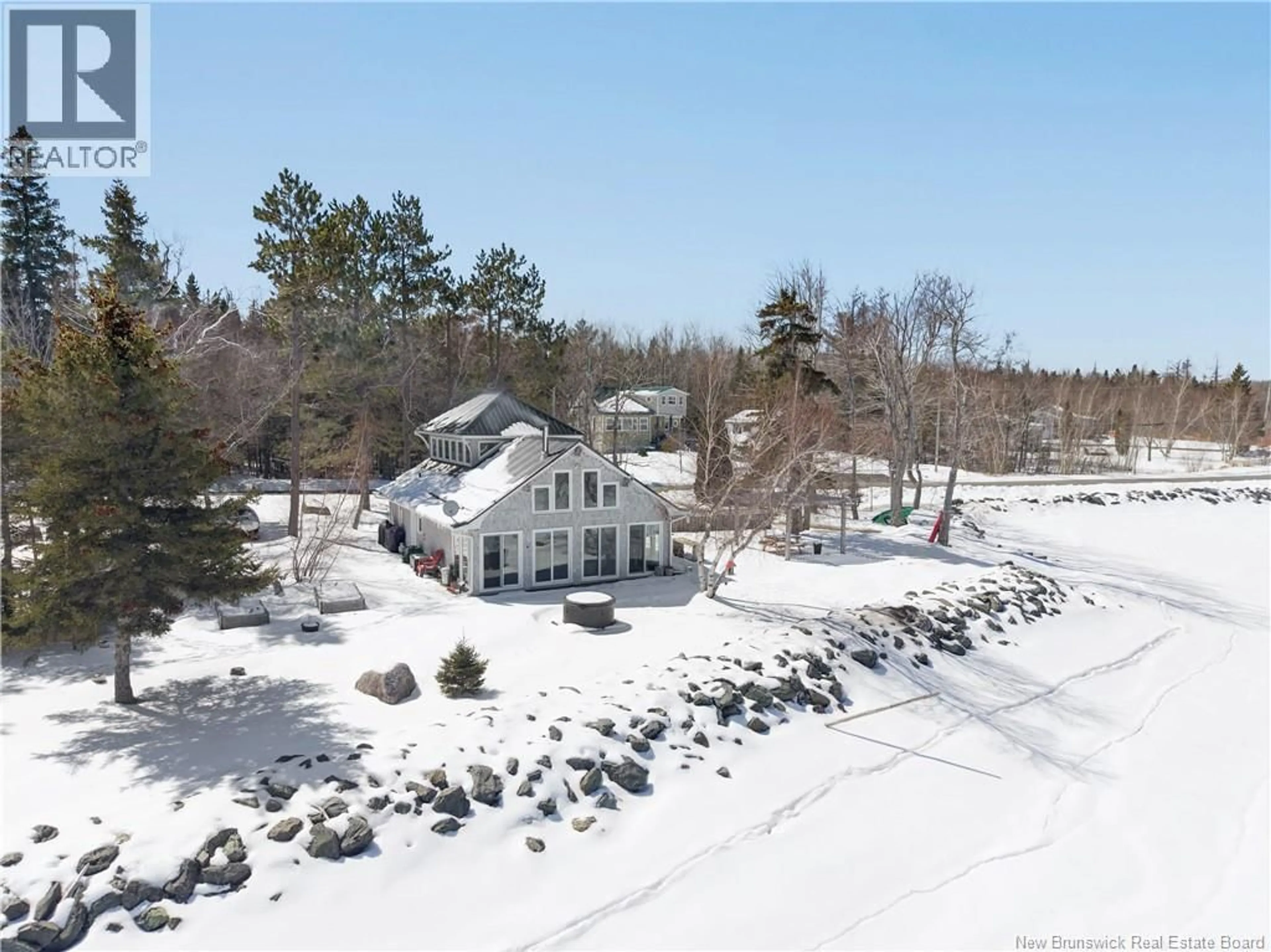 A pic from outside/outdoor area/front of a property/back of a property/a pic from drone, water/lake/river/ocean view for 435 EAST POINT ROAD, Miramichi New Brunswick E1N7A3