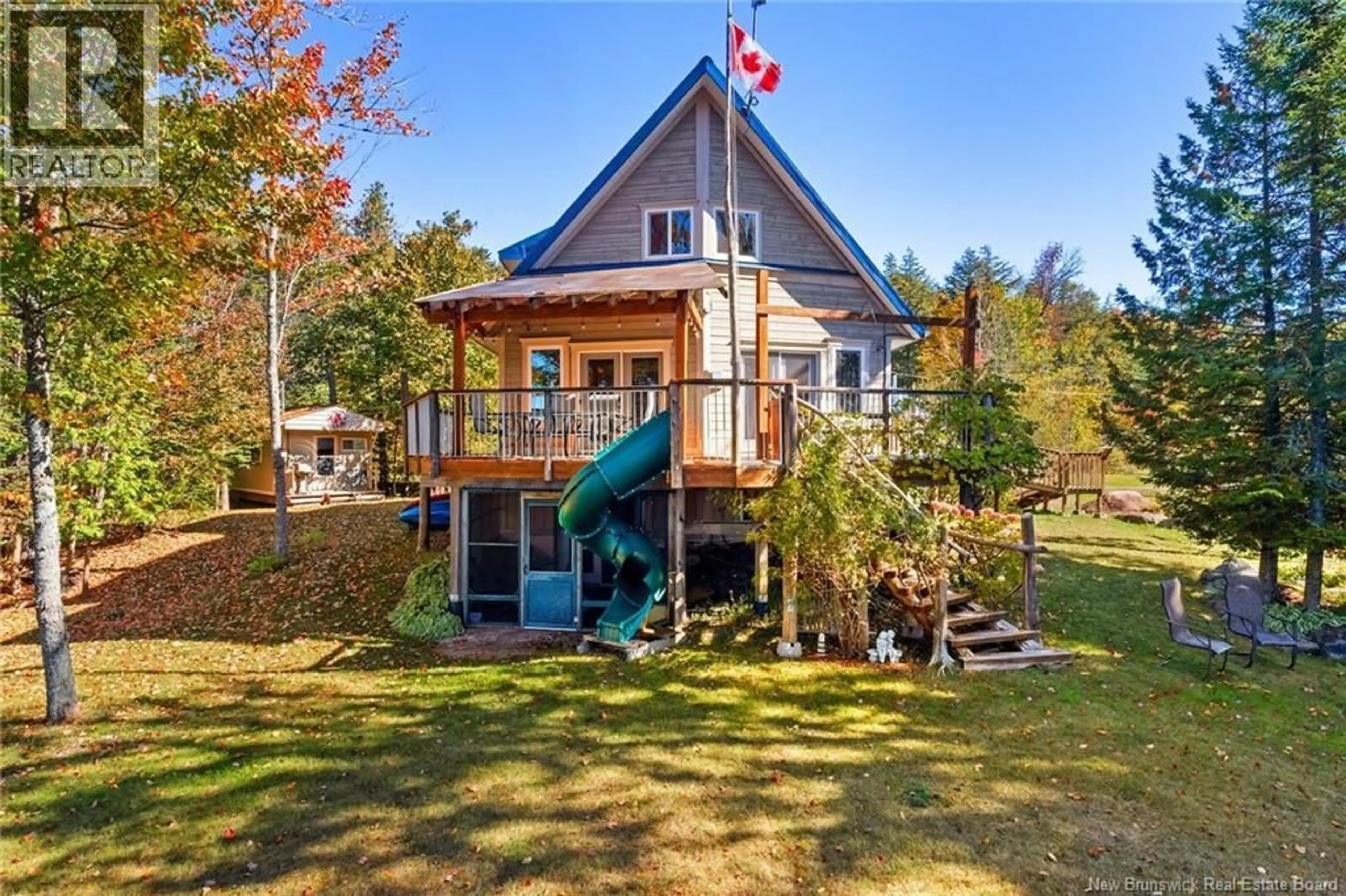 A pic from outside/outdoor area/front of a property/back of a property/a pic from drone, water/lake/river/ocean view for 19 DELONG LANE, Second Eel Lake New Brunswick E6H0B5