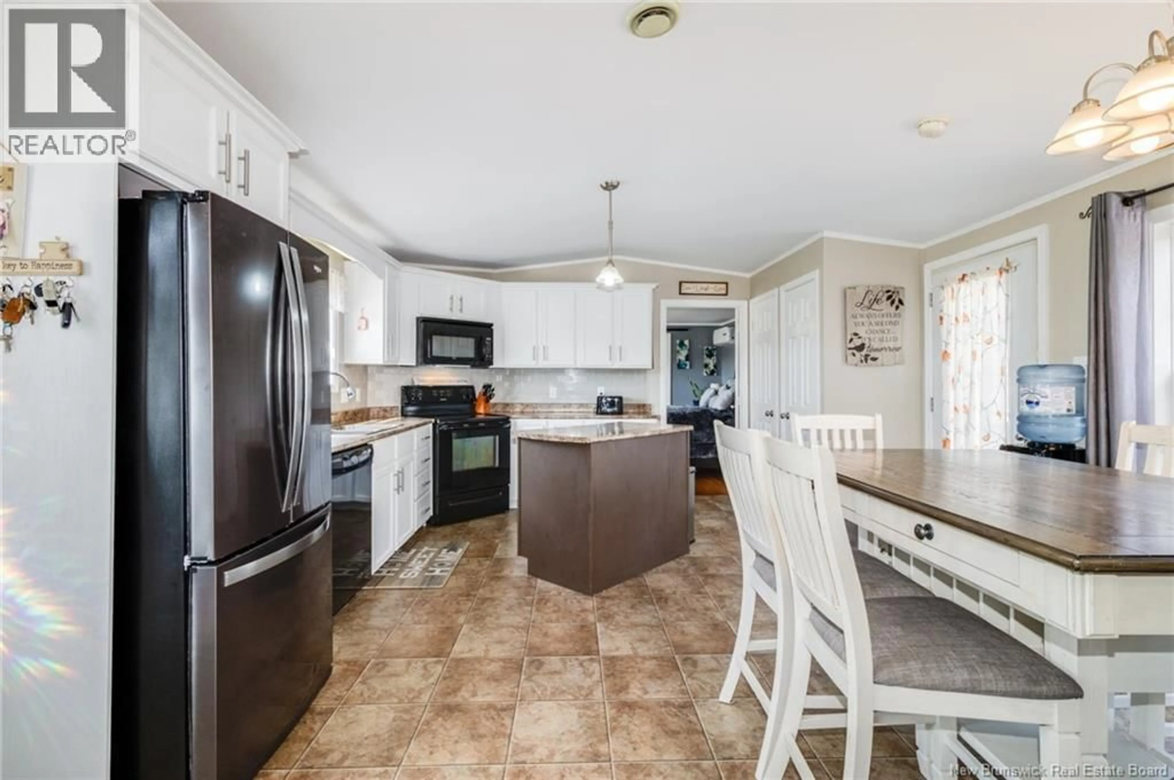 Open concept kitchen, ceramic/tile floor for 27 CARRIE STREET, Rusagonis New Brunswick E3B0T2