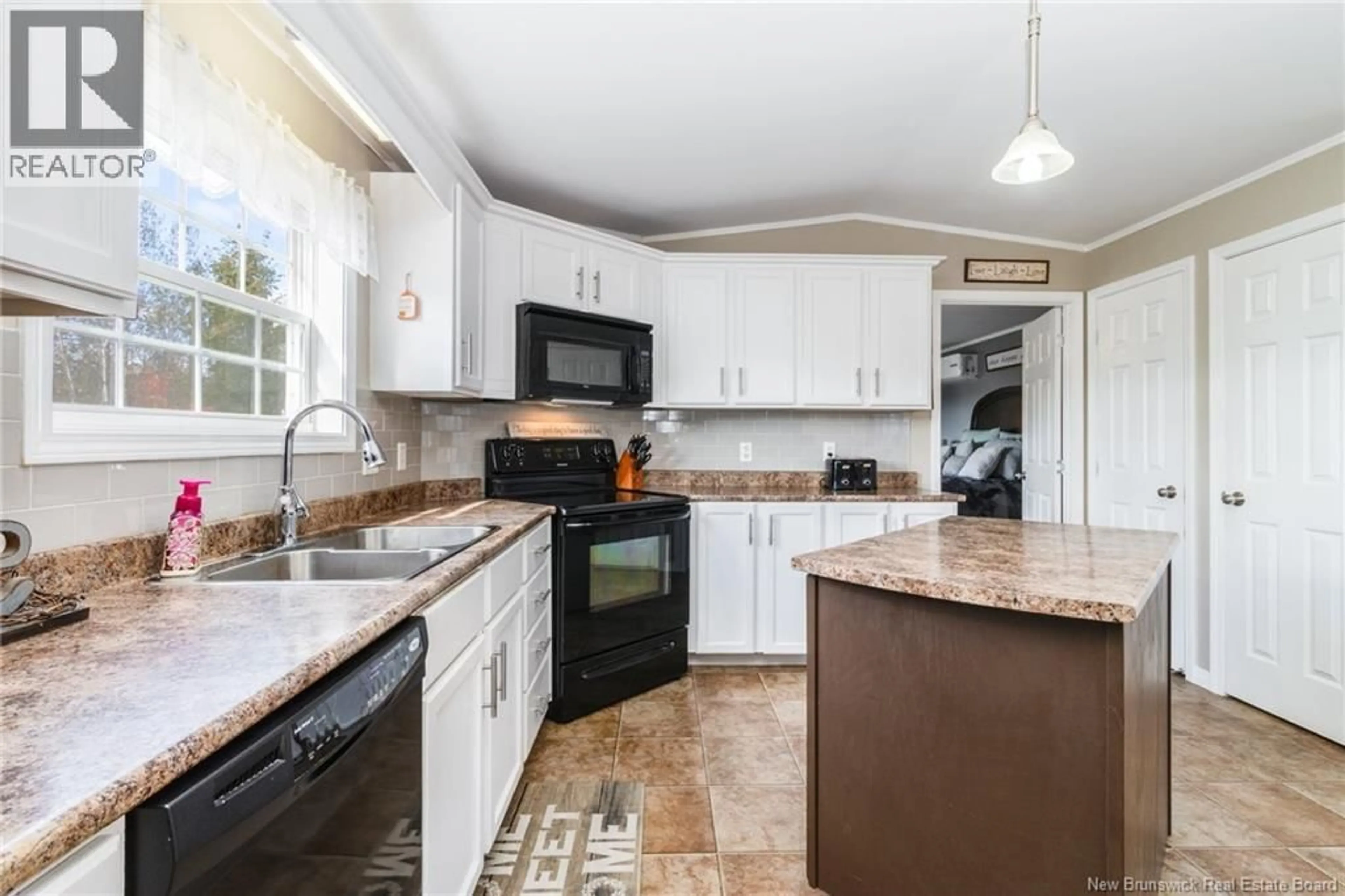 Open concept kitchen, ceramic/tile floor for 27 CARRIE STREET, Rusagonis New Brunswick E3B0T2
