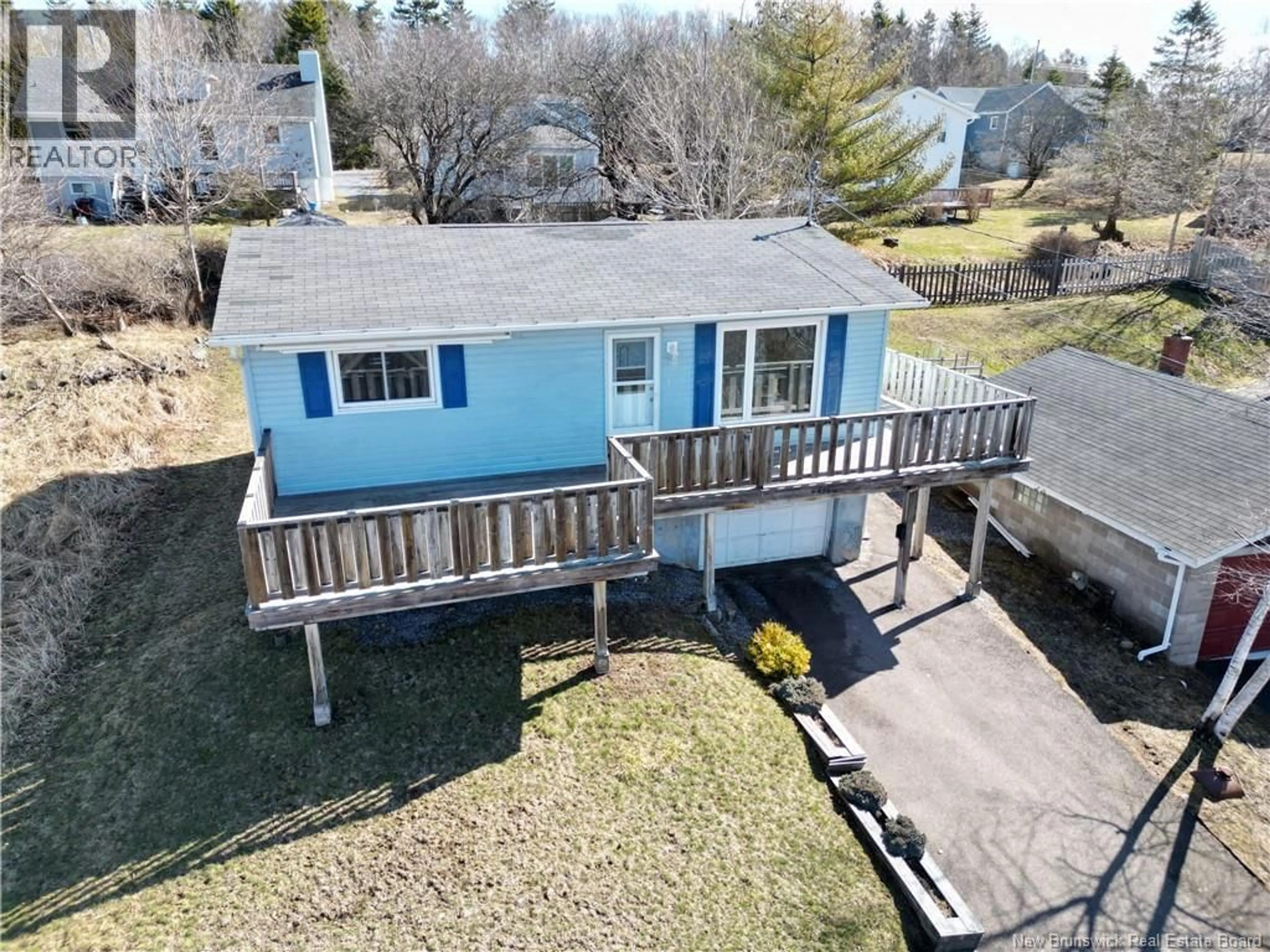 A pic from outside/outdoor area/front of a property/back of a property/a pic from drone, water/lake/river/ocean view for 456 SAINT CLAIR AVENUE, Saint John New Brunswick E2M4W1
