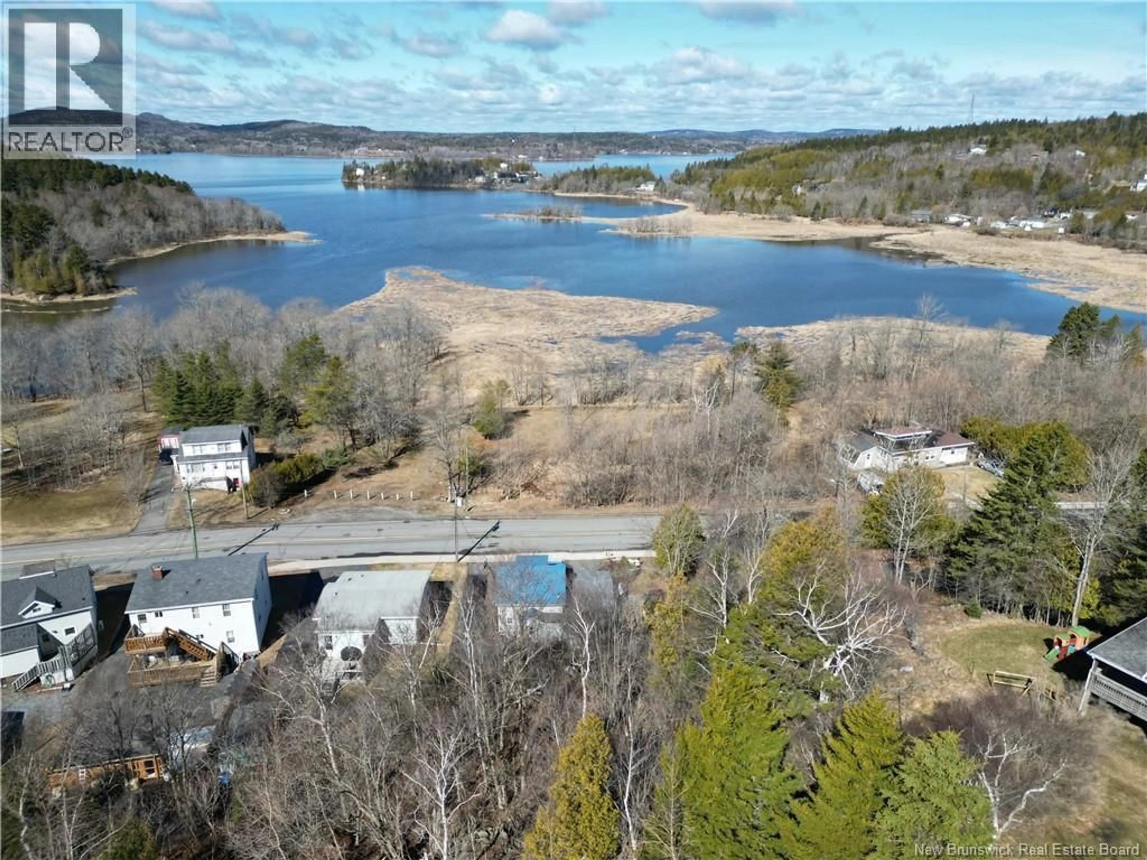 A pic from outside/outdoor area/front of a property/back of a property/a pic from drone, water/lake/river/ocean view for 456 SAINT CLAIR AVENUE, Saint John New Brunswick E2M4W1