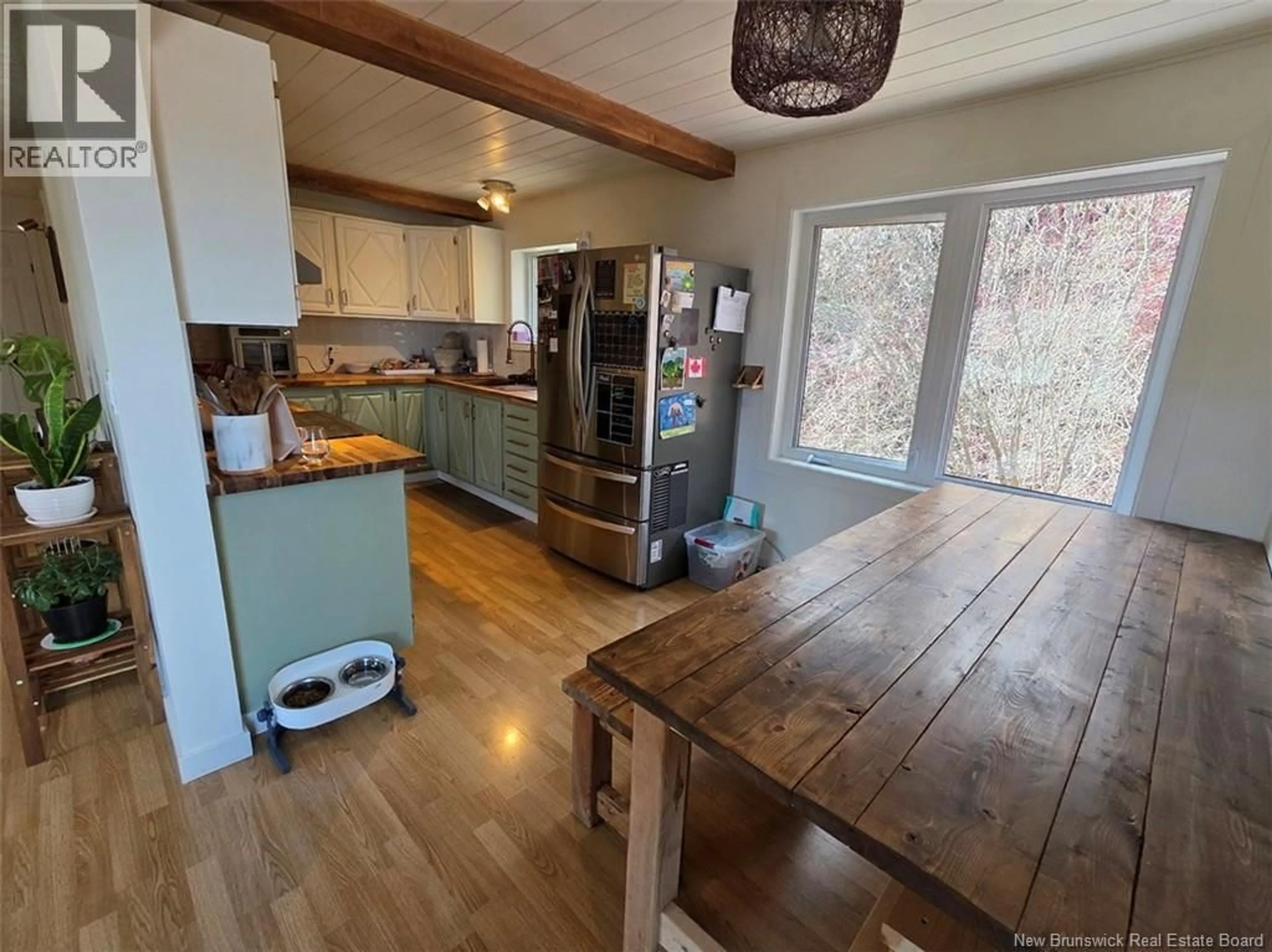 Open concept kitchen, wood/laminate floor for 5722 CENTRALE STREET, Lac Baker New Brunswick E7A1N6