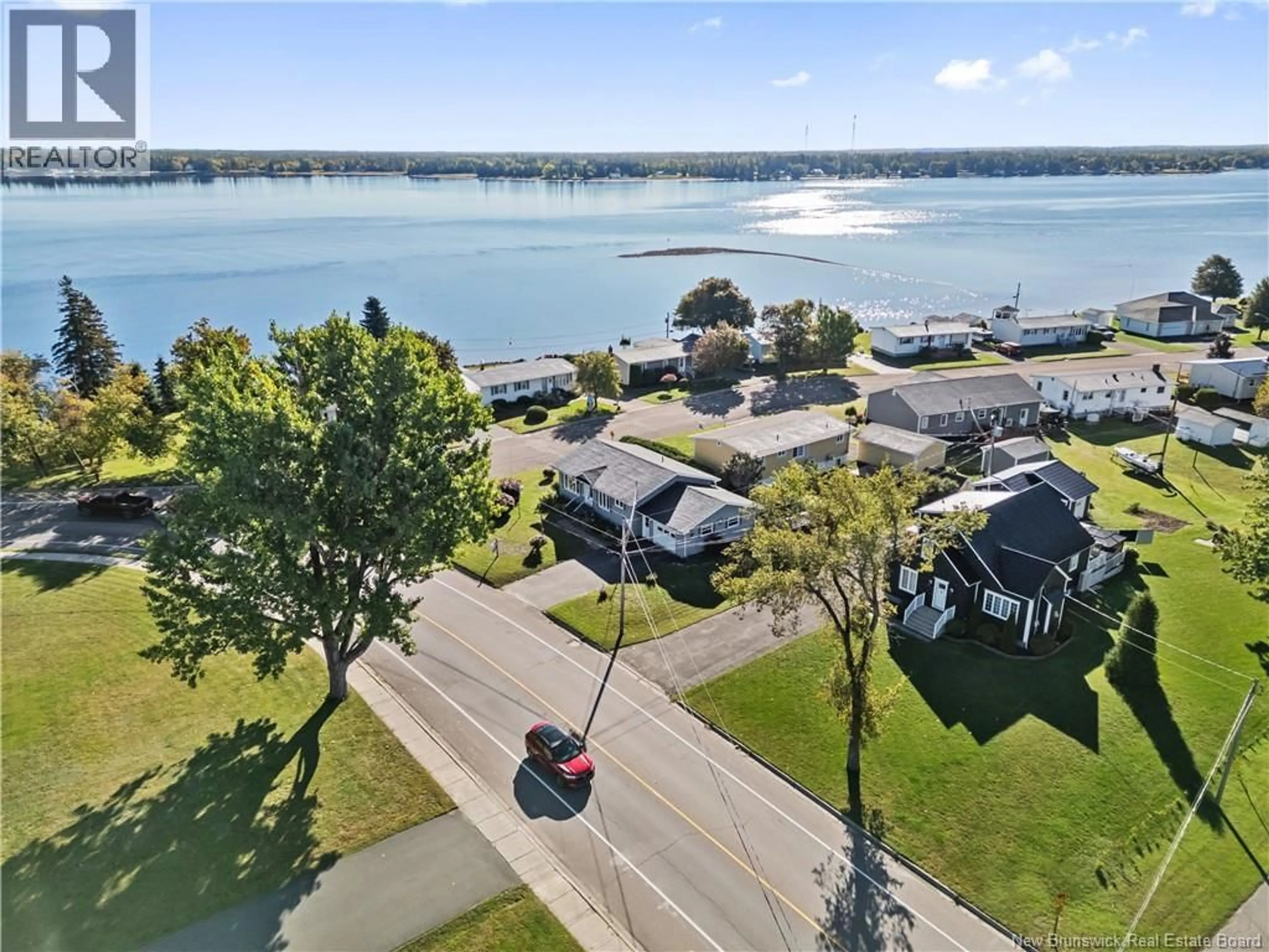 A pic from outside/outdoor area/front of a property/back of a property/a pic from drone, water/lake/river/ocean view for 9305 MAIN STREET, Richibucto New Brunswick E4W4B5