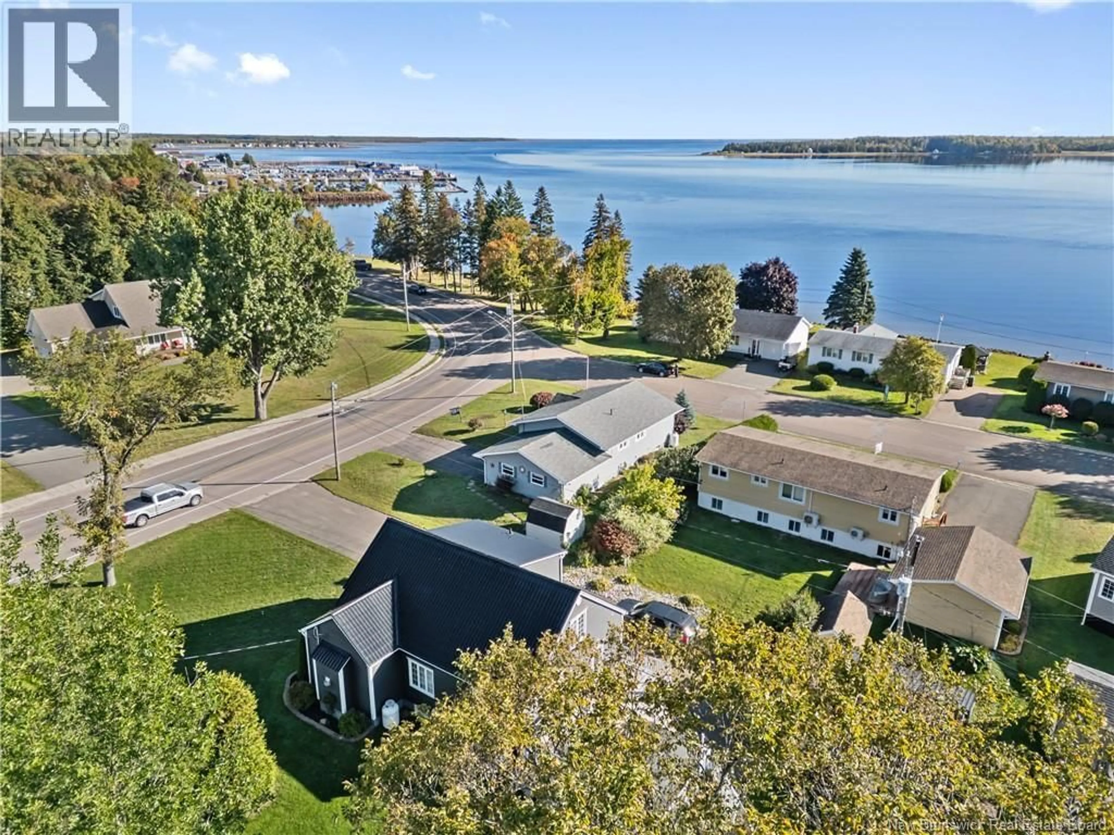 A pic from outside/outdoor area/front of a property/back of a property/a pic from drone, water/lake/river/ocean view for 9305 MAIN STREET, Richibucto New Brunswick E4W4B5