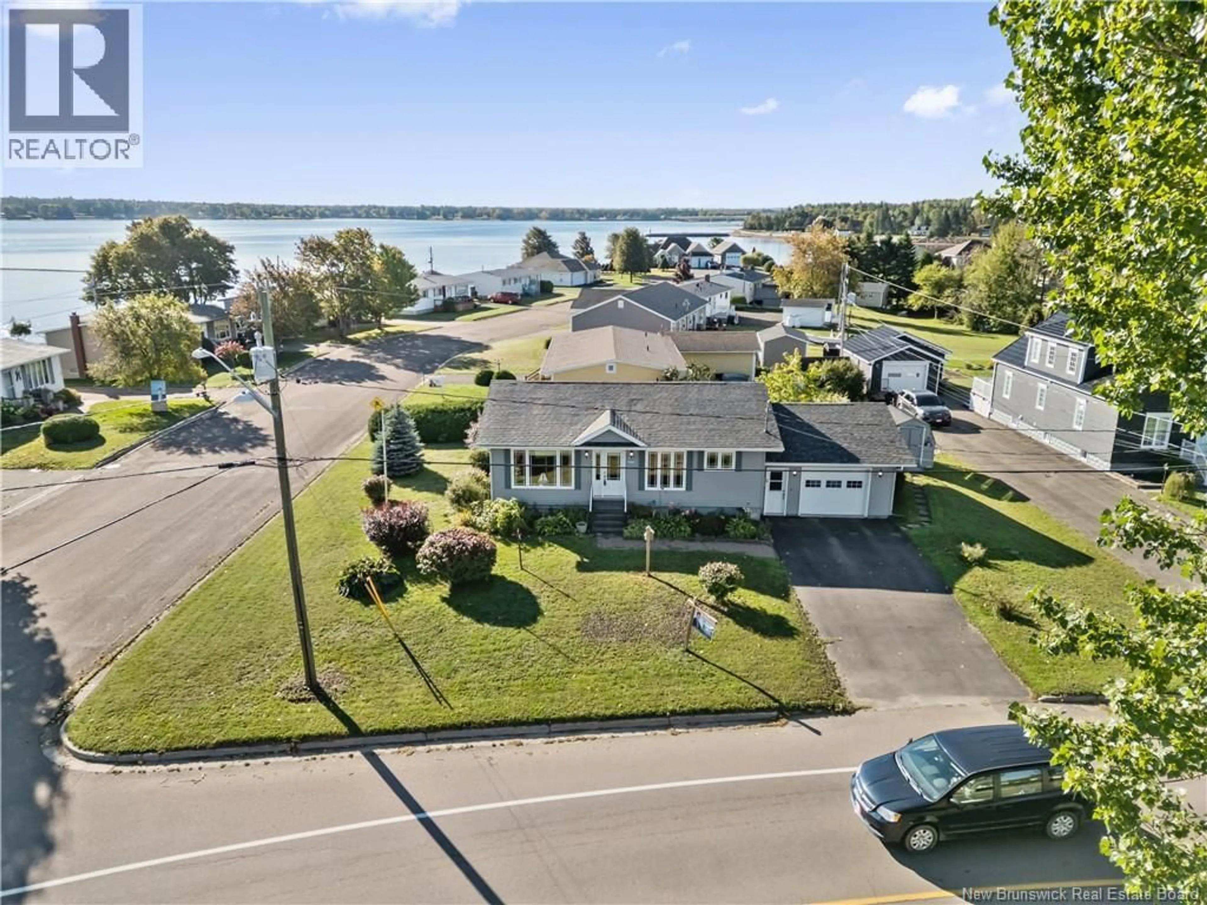 A pic from outside/outdoor area/front of a property/back of a property/a pic from drone, water/lake/river/ocean view for 9305 MAIN STREET, Richibucto New Brunswick E4W4B5