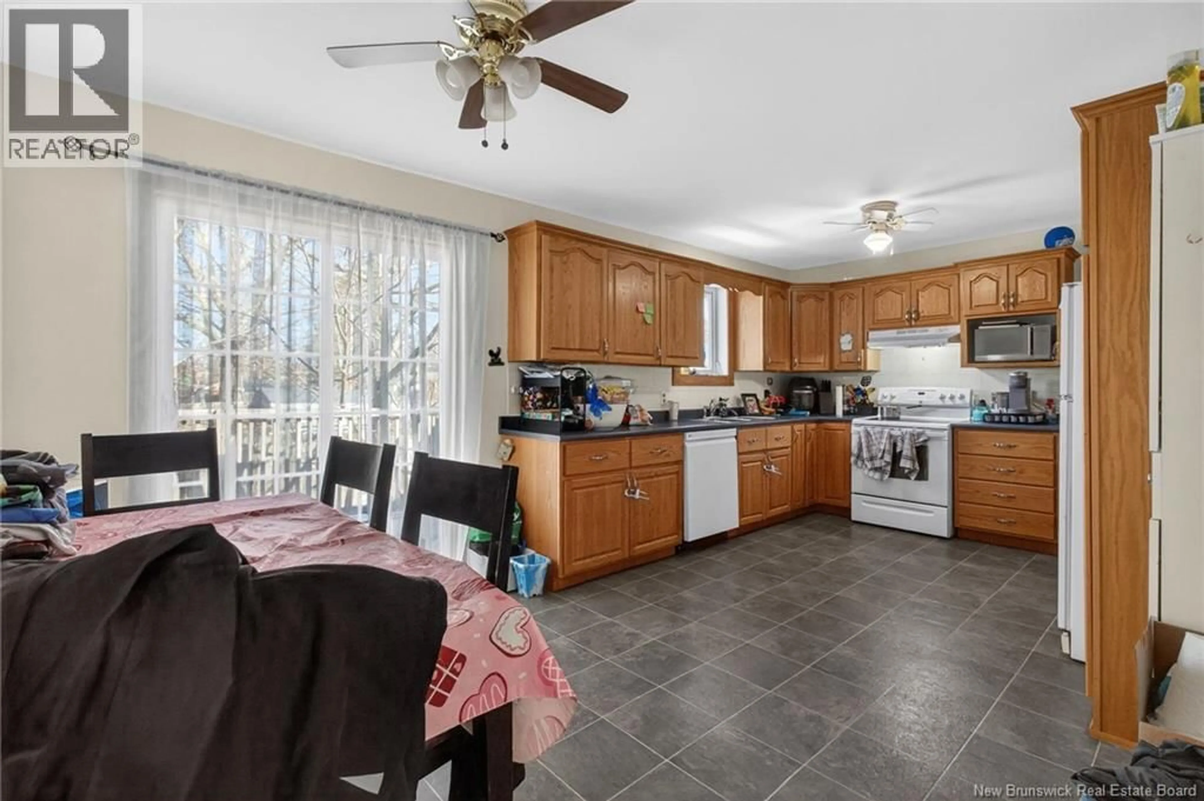 Open concept kitchen, ceramic/tile floor for 23 PEMBROKE STREET, Riverview New Brunswick E1B3Z9